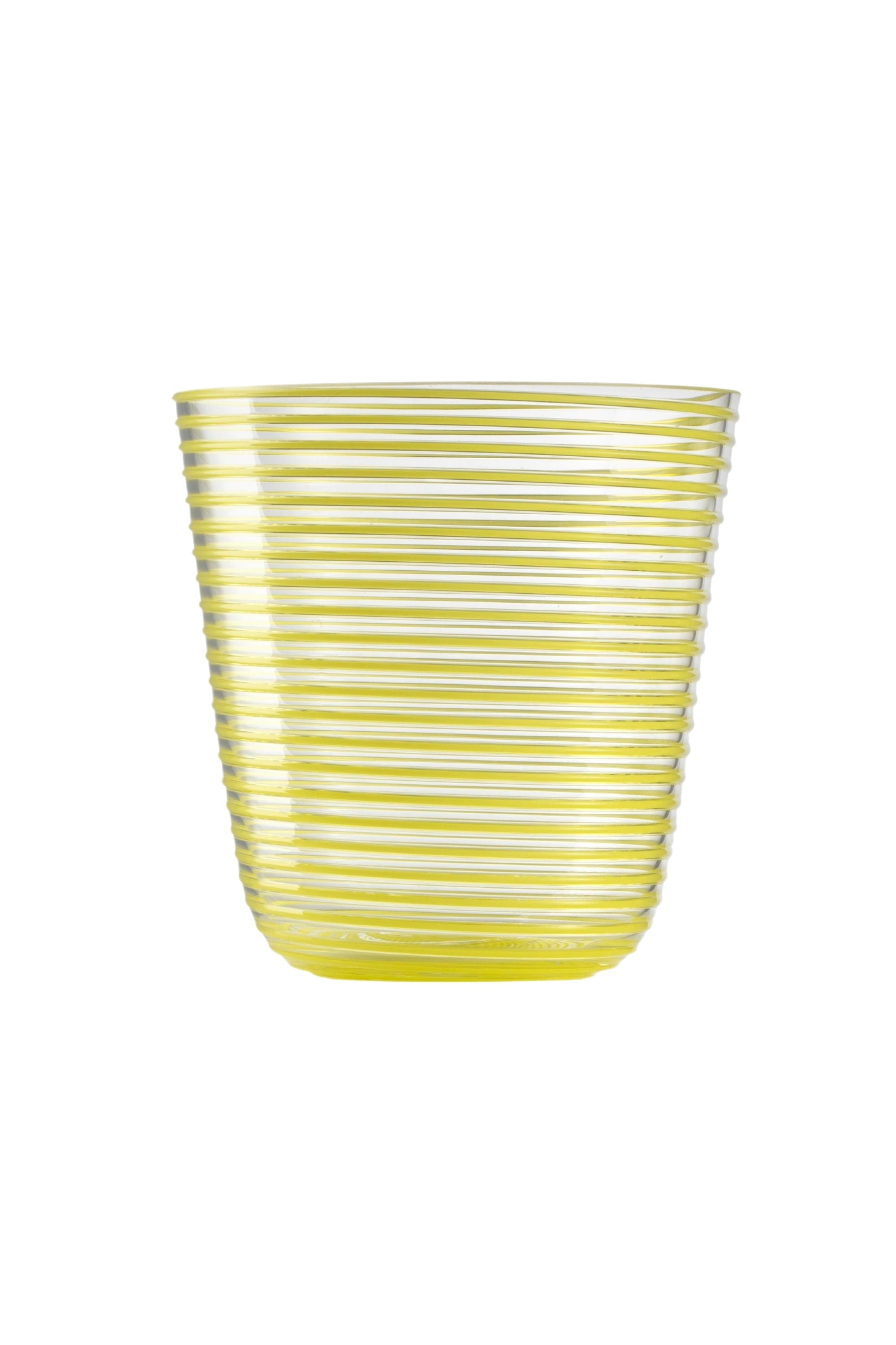 Transparent glass embossed with yellow glass thread spiraling up the cup.
