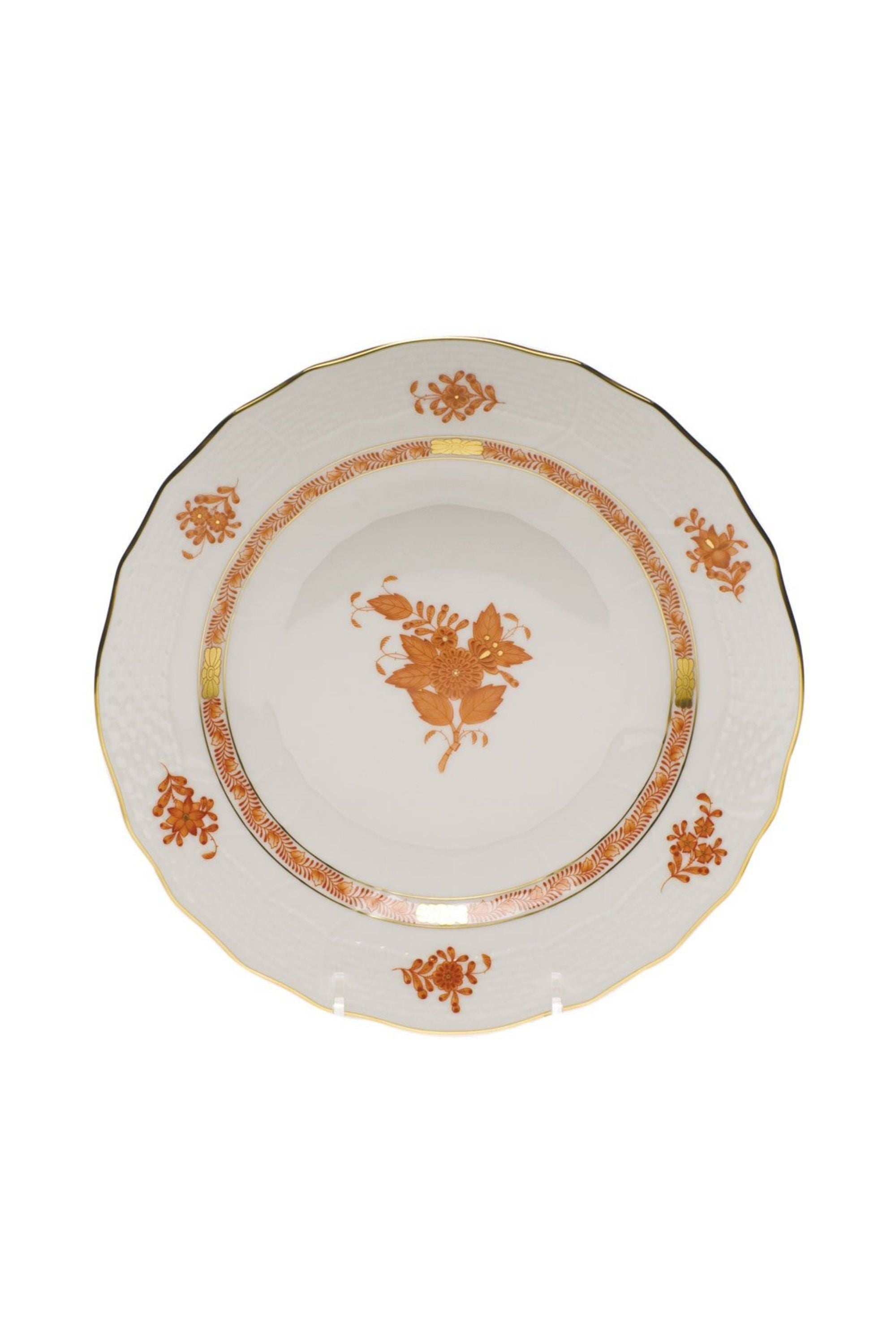 Chinese Bouquet dinnerware is Rust is one of Herend’s most popular Oriental designs from the 1930s. Each piece is hand painted on white porcelain including 24k accents.