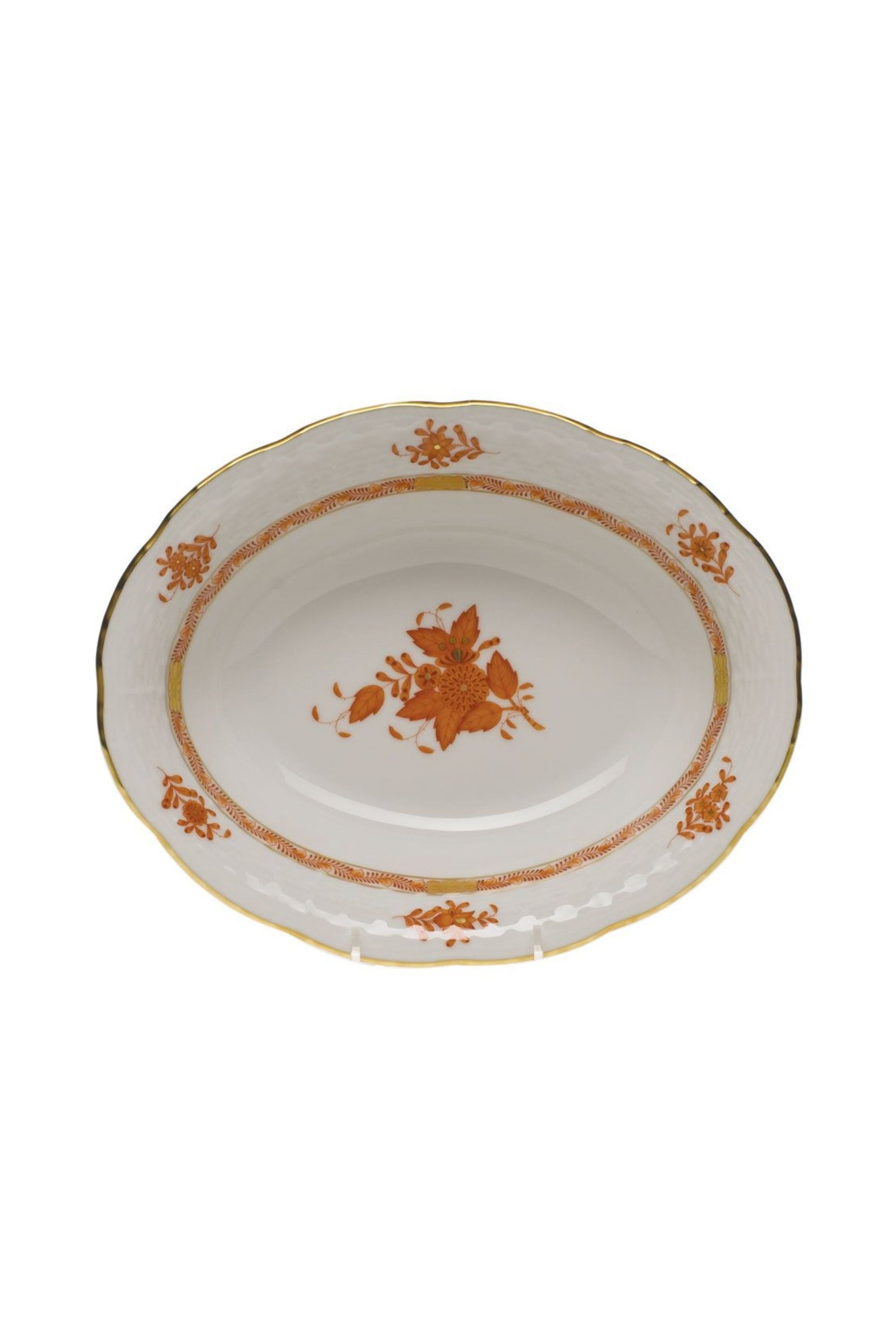 Chinese Bouquet is one of Herend’s most popular Oriental designs from the 1930s. Each piece is hand painted on white porcelain including 24k accents in rust.