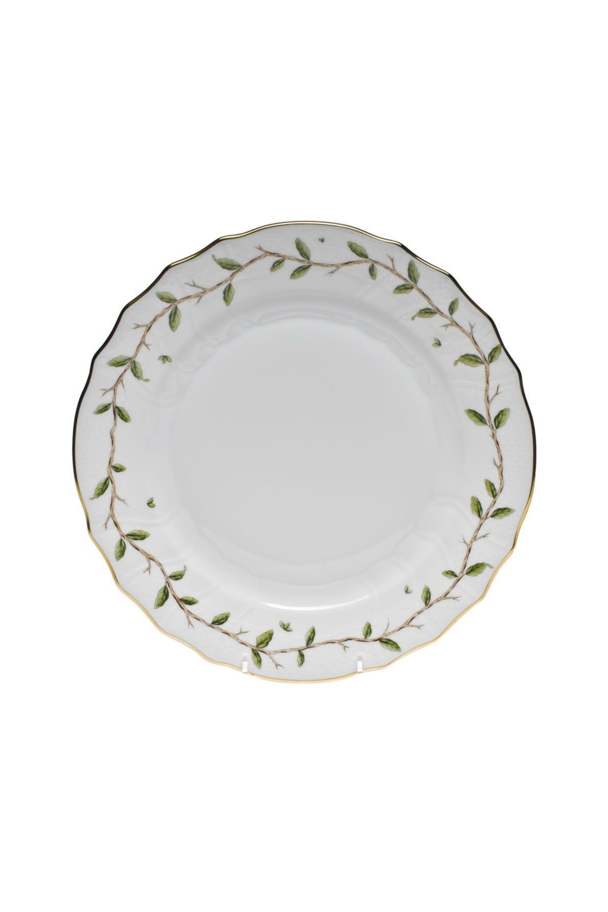 Porcelain dinnerware with garden and vine inspired theme.
