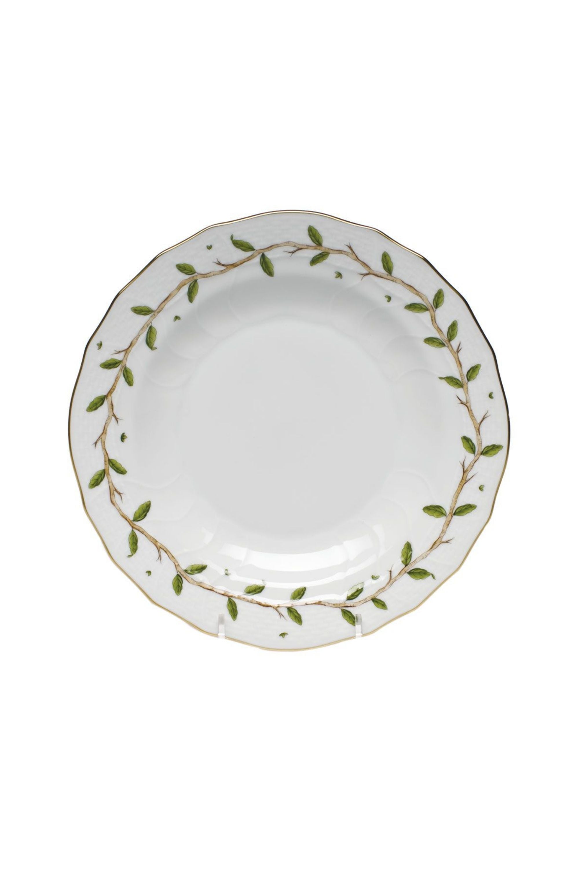 Porcelain dinnerware with garden and vine inspired theme.