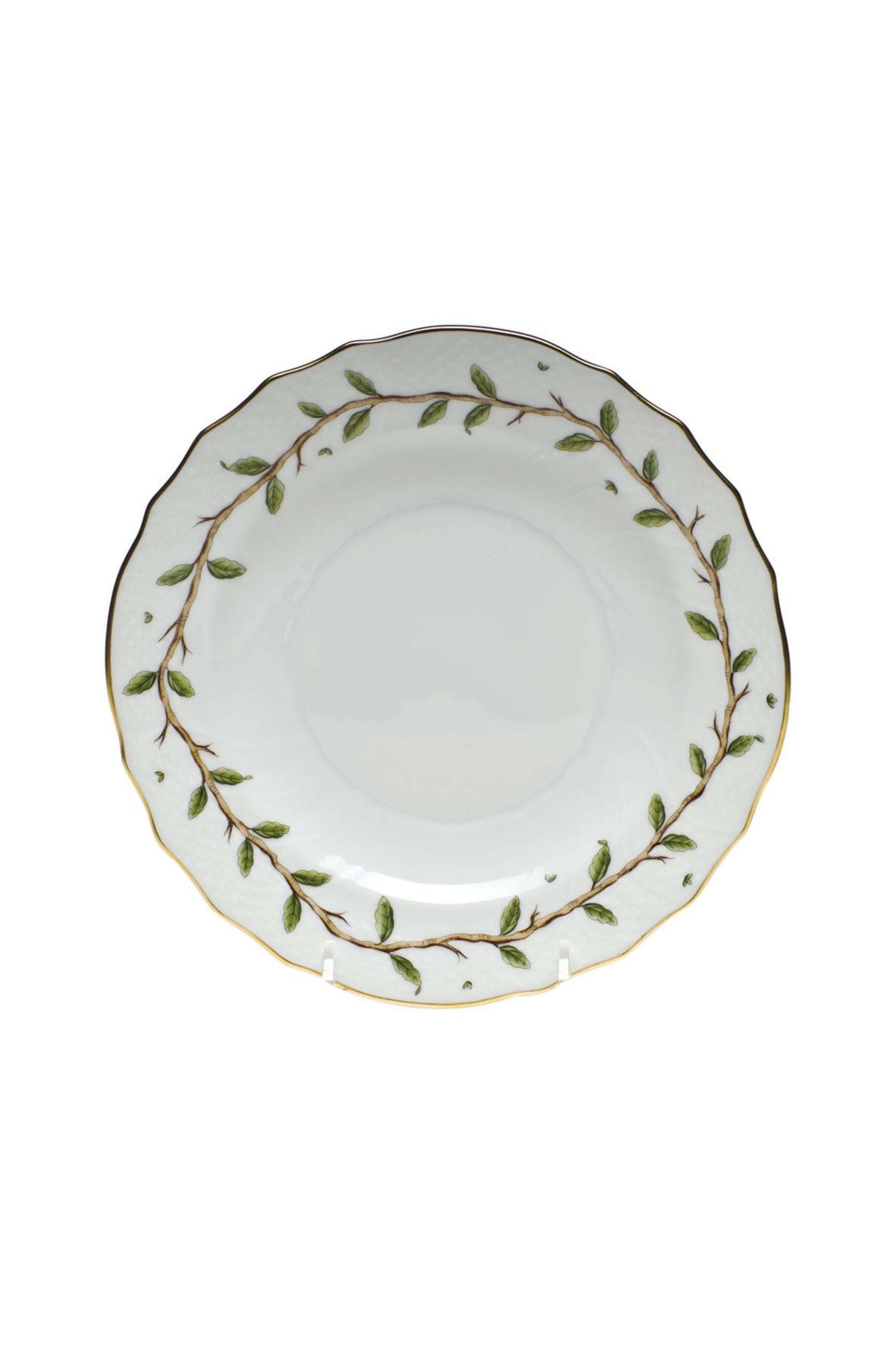 Porcelain dinnerware with garden and vine inspired theme.