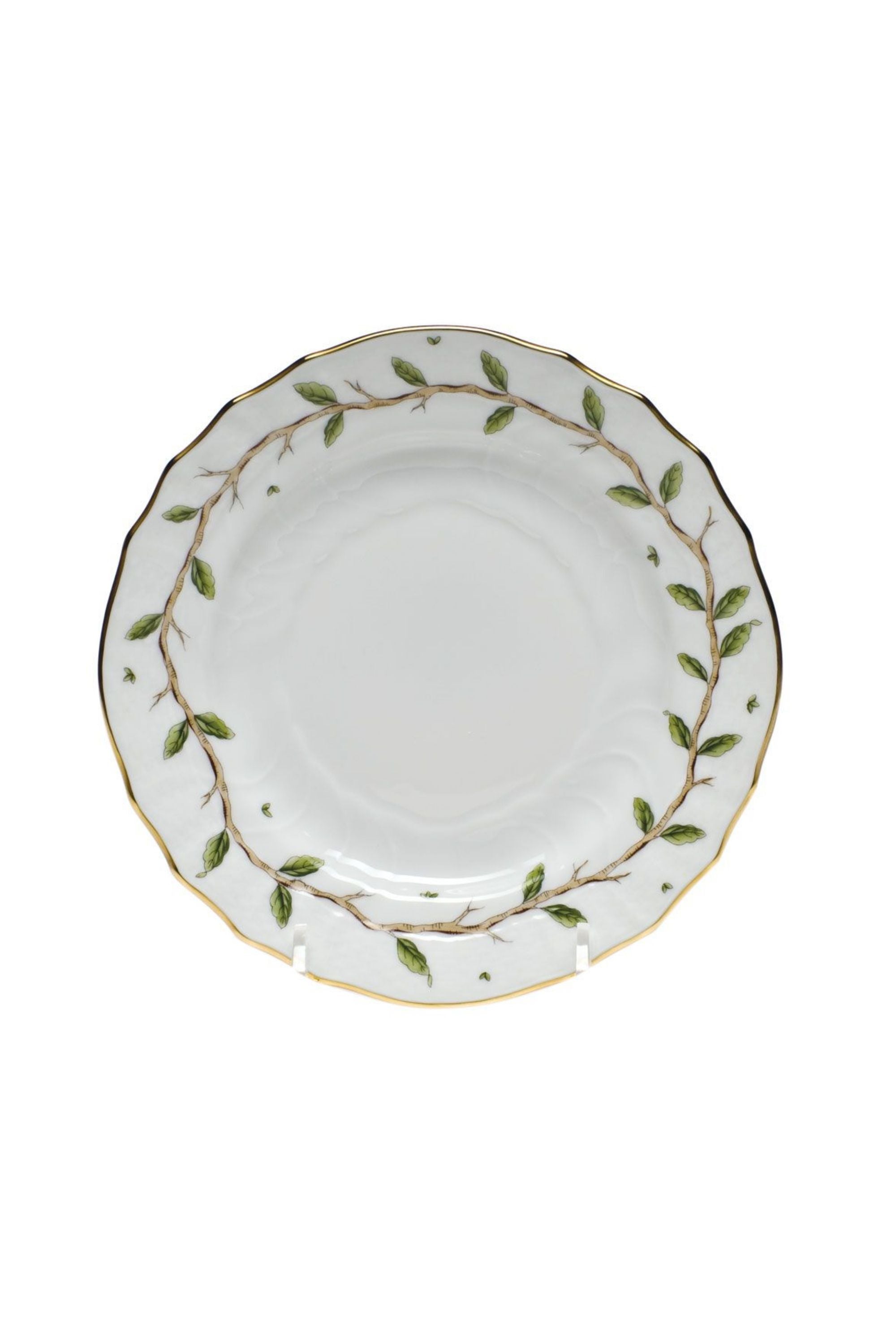 Porcelain dinnerware with garden and vine inspired theme.