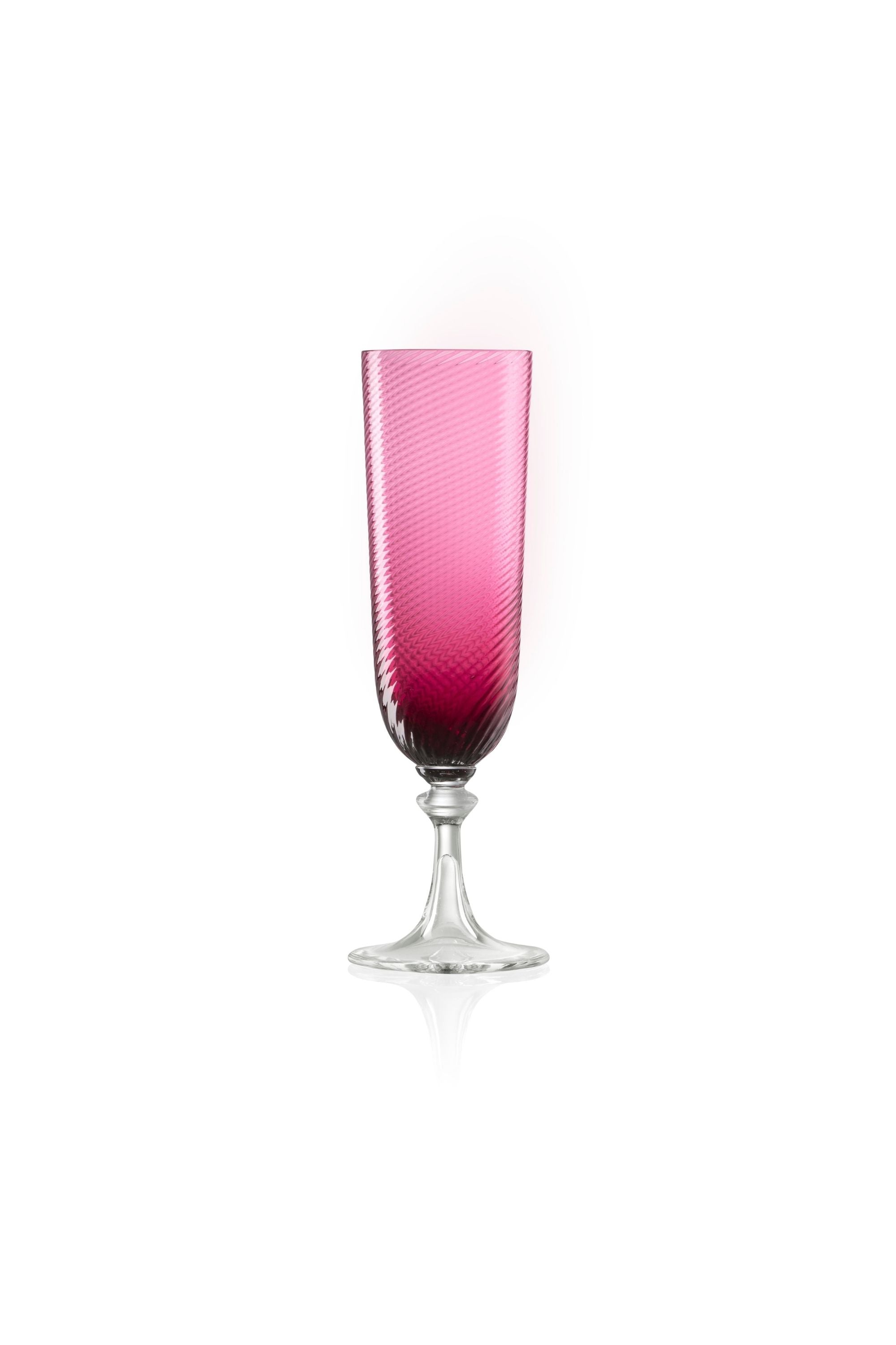 Handblown on the Venetian Island of Murano, these glasses feature a handmade stem and twisted texture in Ruby Red. The elegant form made in glass makes this a versatile chameleon to be used with stoneware or china.