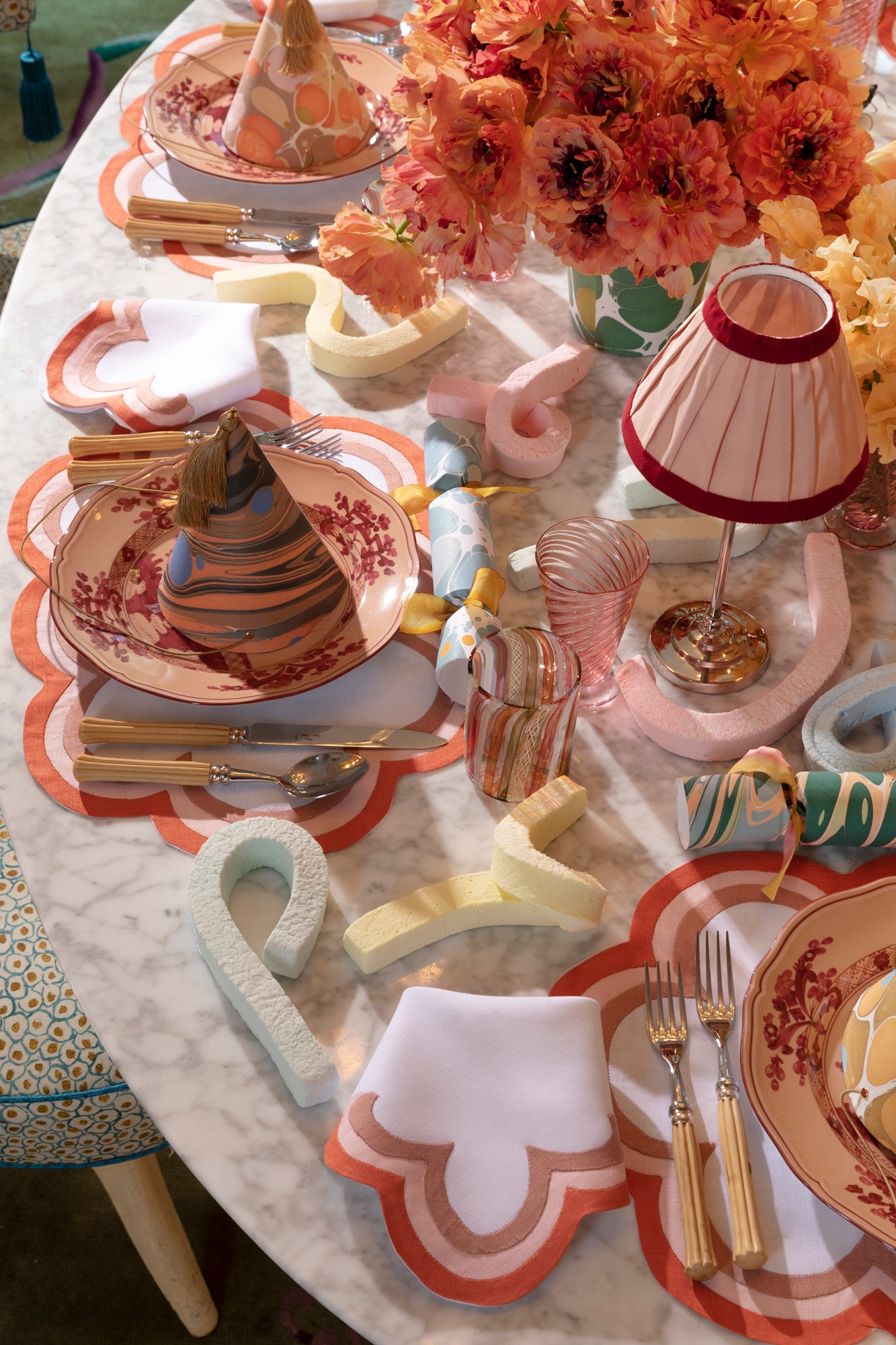 Pink and sherbert tabletop for eight.