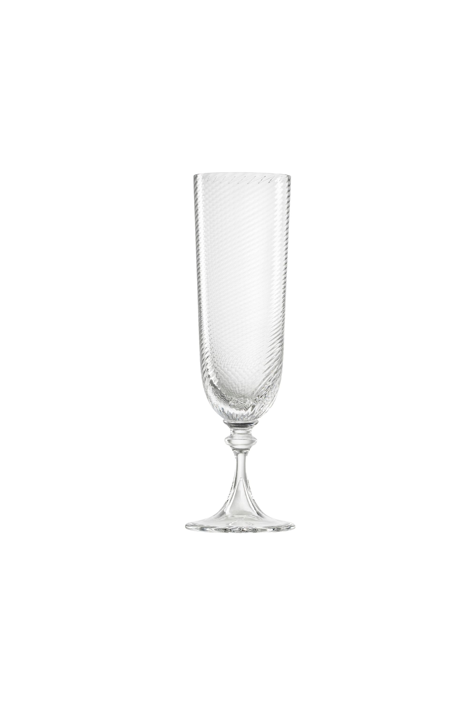Handblown on the Venetian Island of Murano, these glasses feature a handmade stem and twisted texture in Clear. The elegant form made in glass makes this a versatile chameleon to be used with stoneware or china.