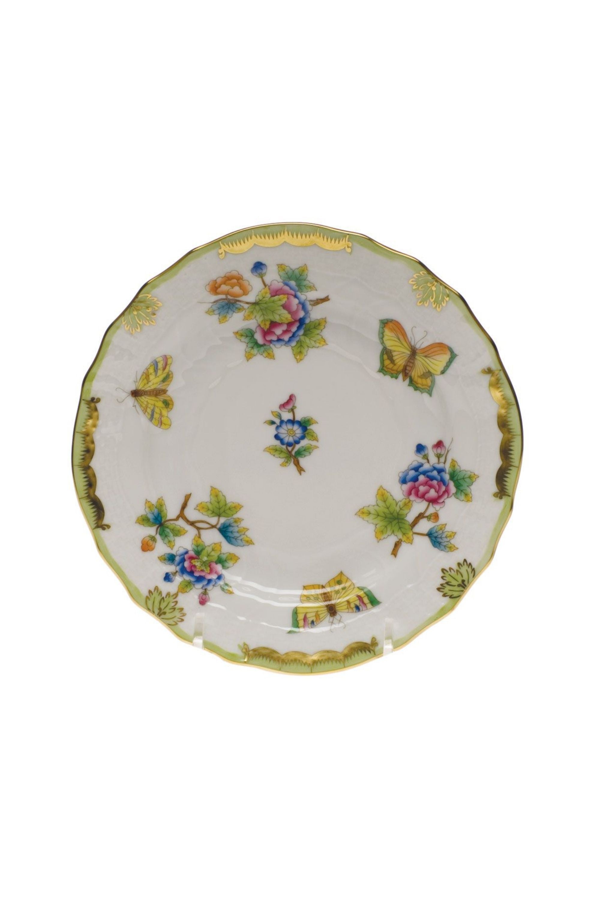 Porcelain dinnerware with butterflies and flowers. The original set, introduced in 1851 at the First World Exhibition in London, was purchased by Queen Victoria herself. Subsequently named for her, this Chinese-influenced pattern demands the skills of Herend's most talented and experienced painters.