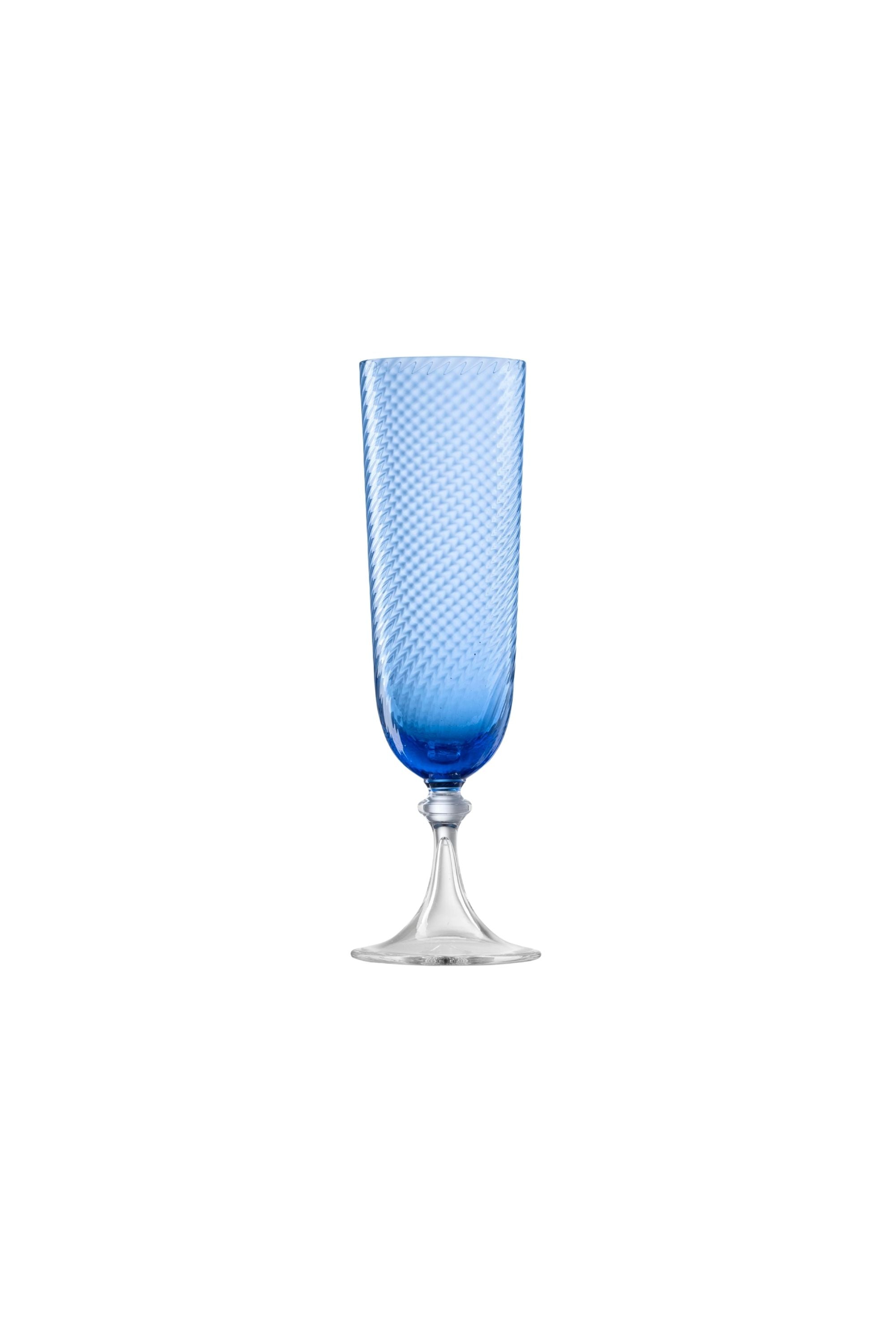 Handblown on the Venetian Island of Murano, these glasses feature a handmade stem and twisted texture in Blue. The elegant form made in glass makes this a versatile chameleon to be used with stoneware or china.
