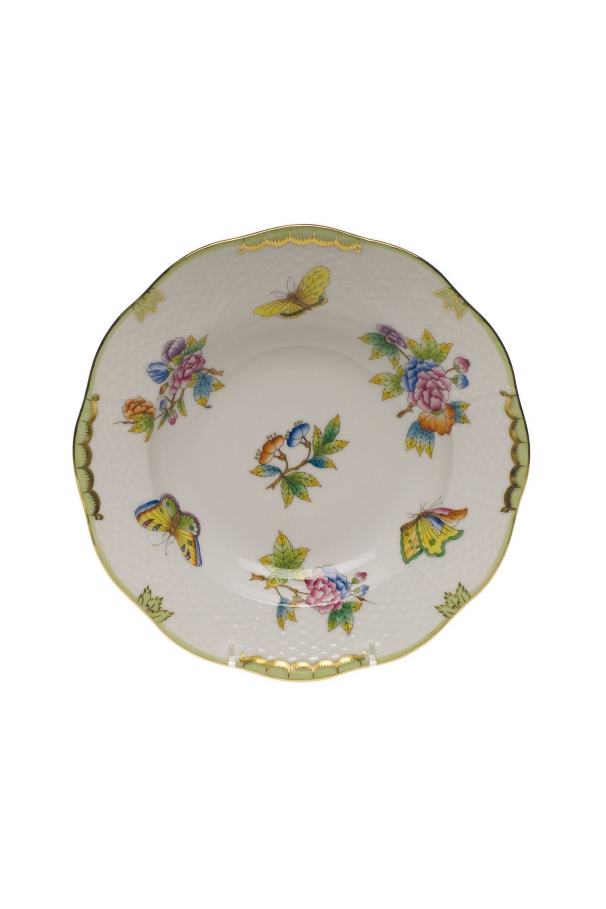 Porcelain dinnerware with butterflies and flowers. The original set, introduced in 1851 at the First World Exhibition in London, was purchased by Queen Victoria herself. Subsequently named for her, this Chinese-influenced pattern demands the skills of Herend's most talented and experienced painters.