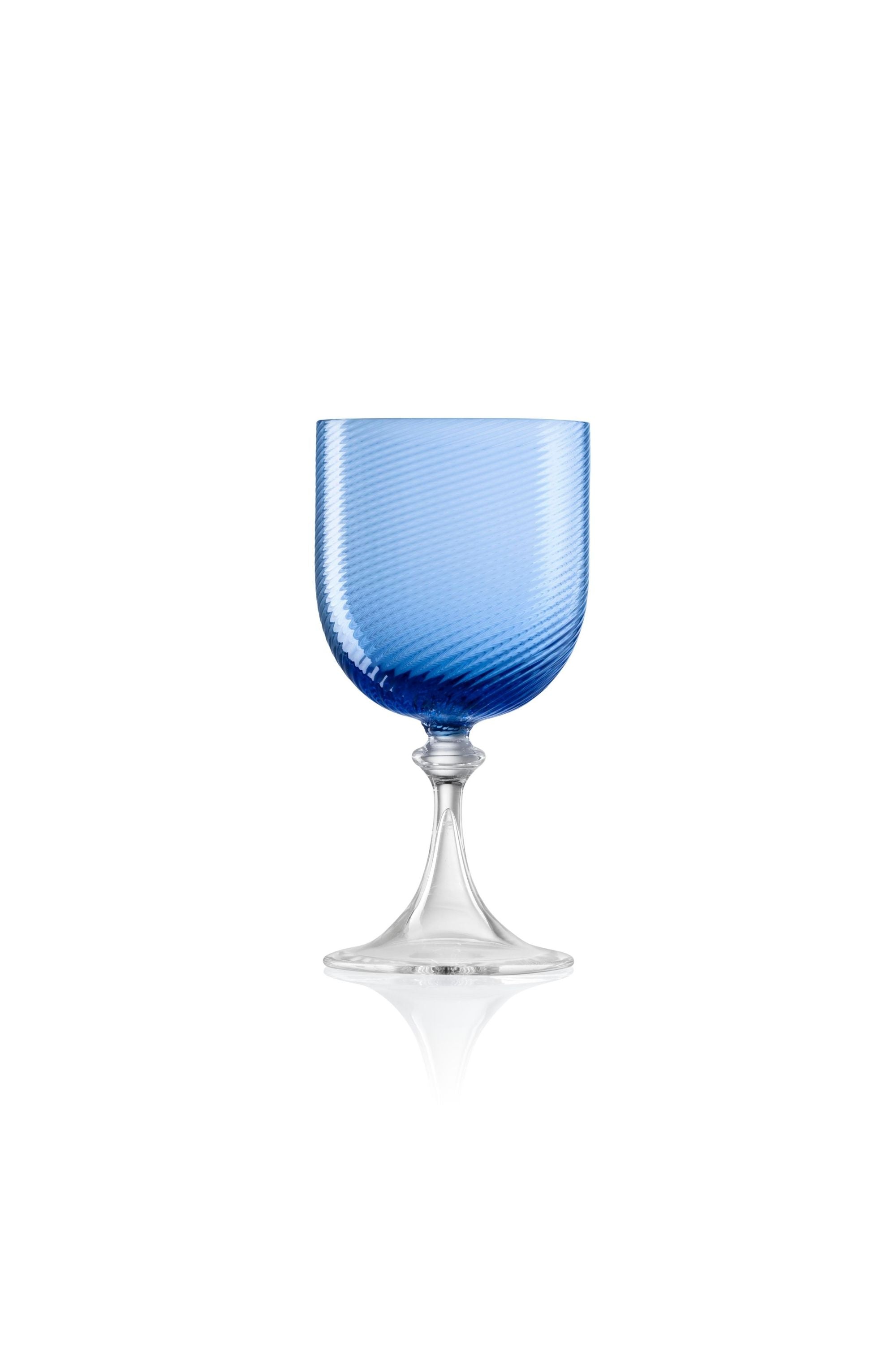 Handblown on the Venetian Island of Murano, these glasses feature a handmade stem and twisted texture in Blue. The elegant form made in glass makes this a versatile chameleon to be used with stoneware or china.