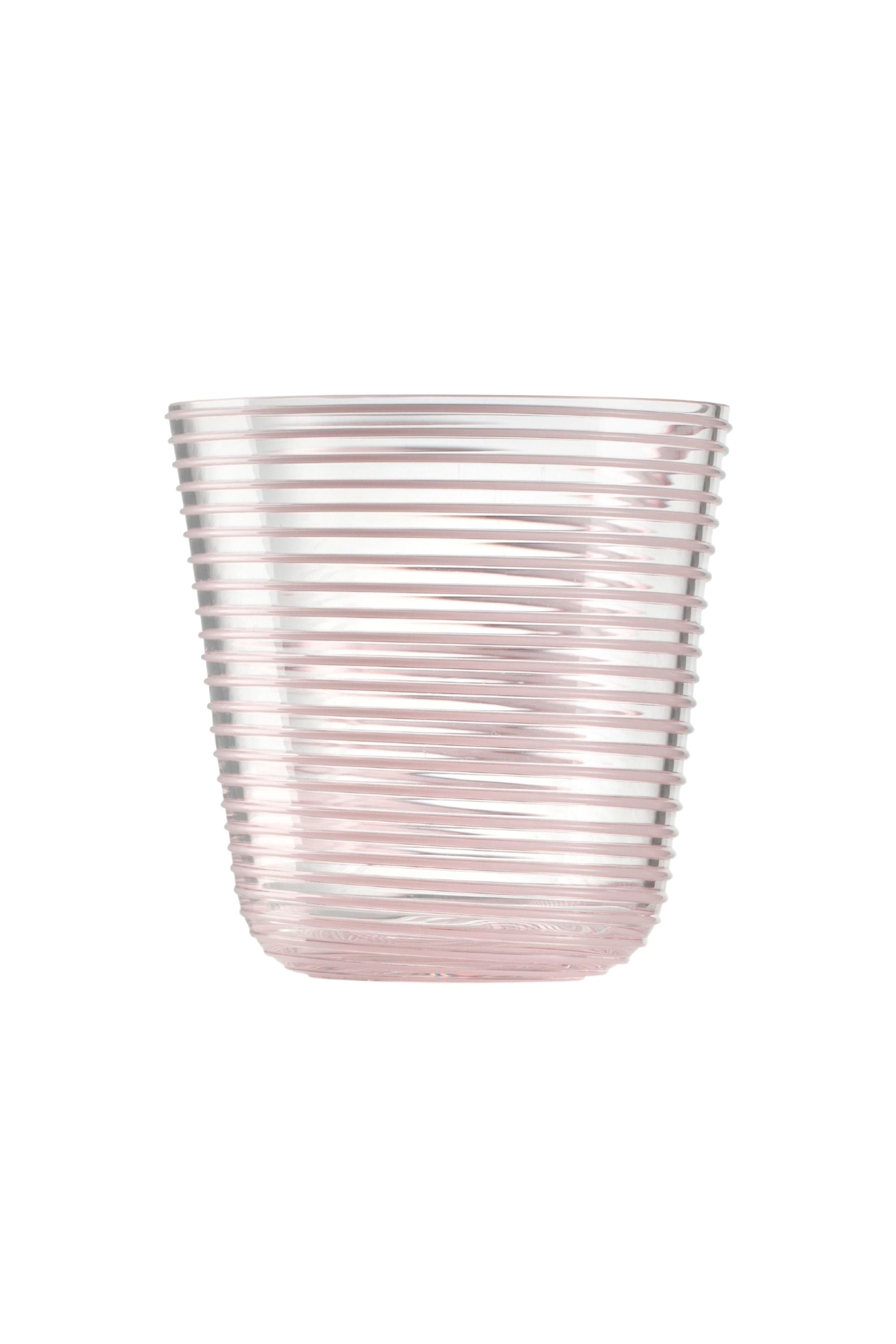 Transparent glass embossed with mauve glass thread spiraling up the cup.