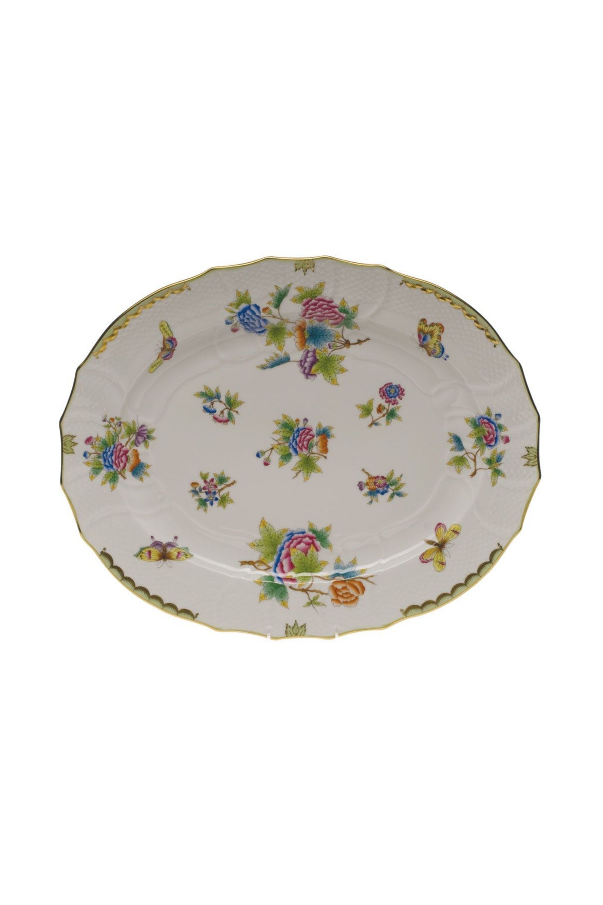 Porcelain serving dishes. The original set, introduced in 1851 at the First World Exhibition in London, was purchased by Queen Victoria herself. Subsequently named for her, this Chinese-influenced pattern demands the skills of Herend's most talented and experienced painters.