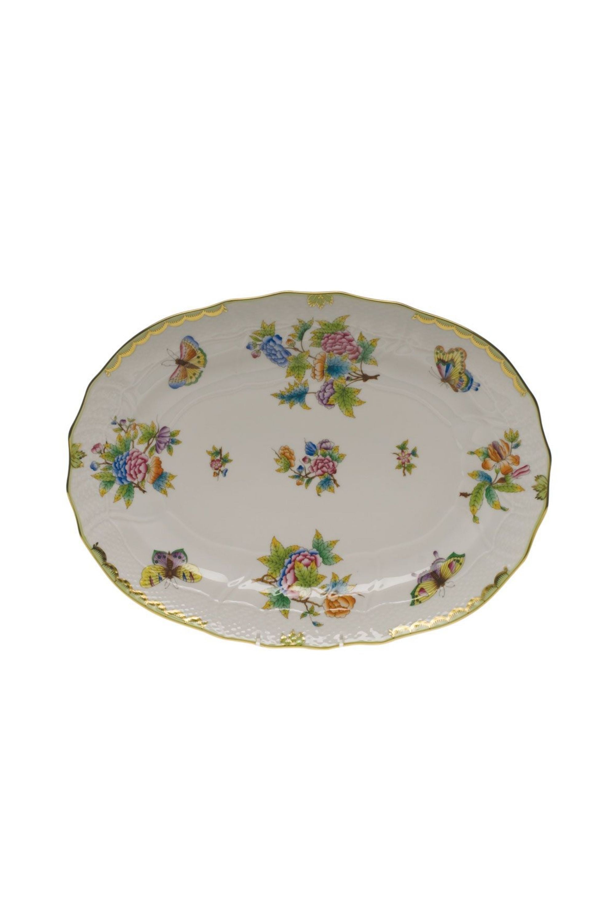 Porcelain serving dishes. The original set, introduced in 1851 at the First World Exhibition in London, was purchased by Queen Victoria herself. Subsequently named for her, this Chinese-influenced pattern demands the skills of Herend's most talented and experienced painters.