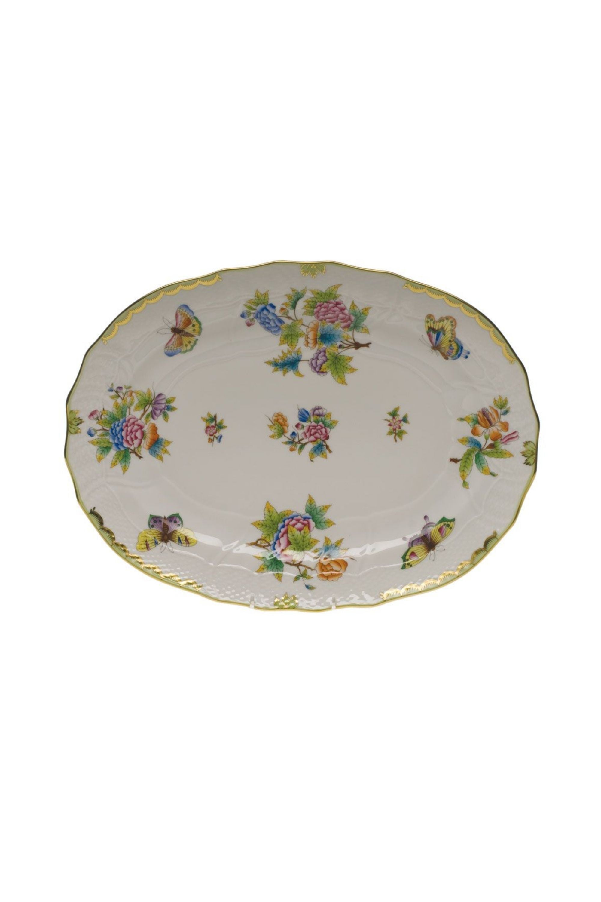 Porcelain serving dishes. The original set, introduced in 1851 at the First World Exhibition in London, was purchased by Queen Victoria herself. Subsequently named for her, this Chinese-influenced pattern demands the skills of Herend's most talented and experienced painters.