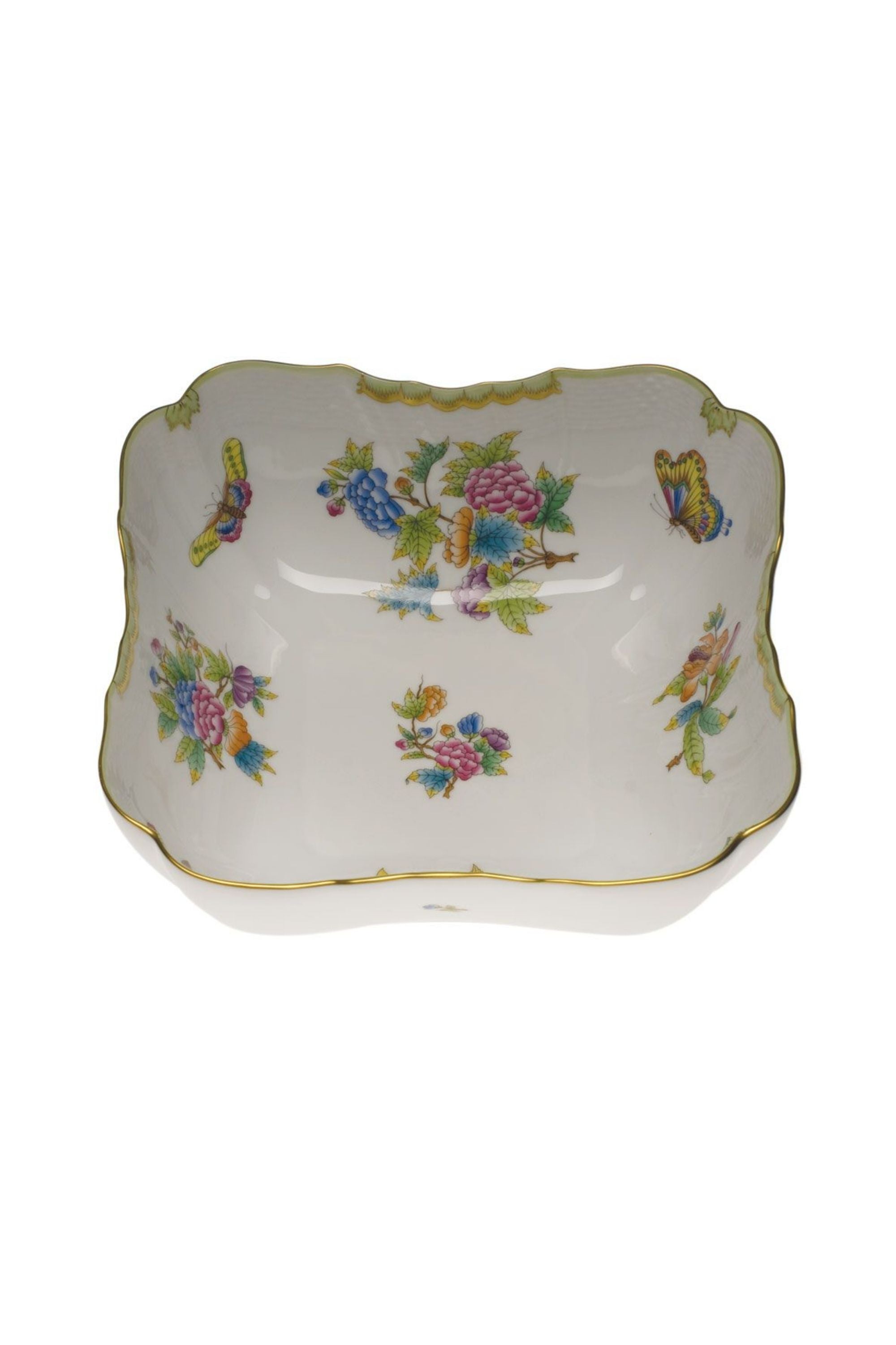 Porcelain serving dishes. The original set, introduced in 1851 at the First World Exhibition in London, was purchased by Queen Victoria herself. Subsequently named for her, this Chinese-influenced pattern demands the skills of Herend's most talented and experienced painters.