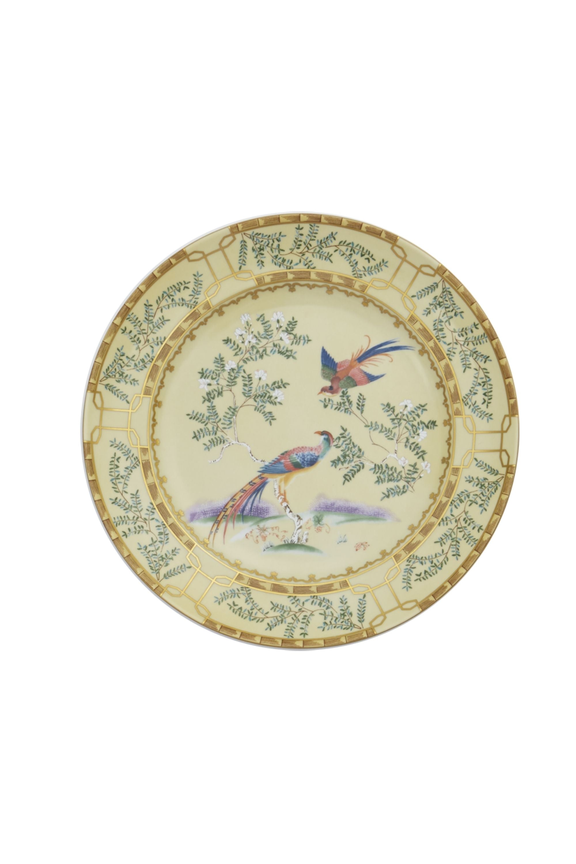 Chinese dinnerware. The decoration incorporates blossoming trees, hanging baskets of flowers, and exotic birds.