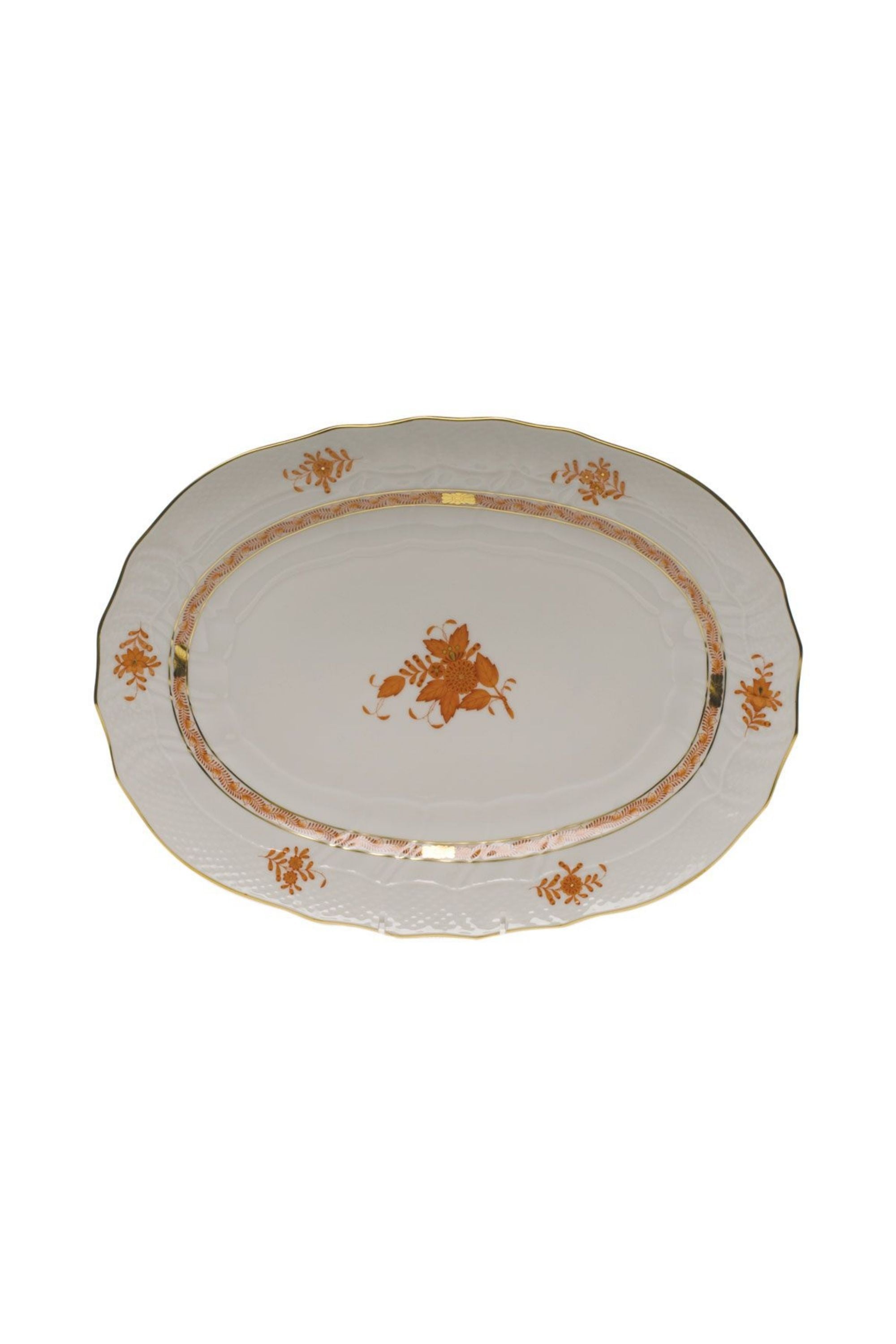 Chinese Bouquet is one of Herend’s most popular Oriental designs from the 1930s. Each piece is hand painted on white porcelain including 24k accents in rust.
