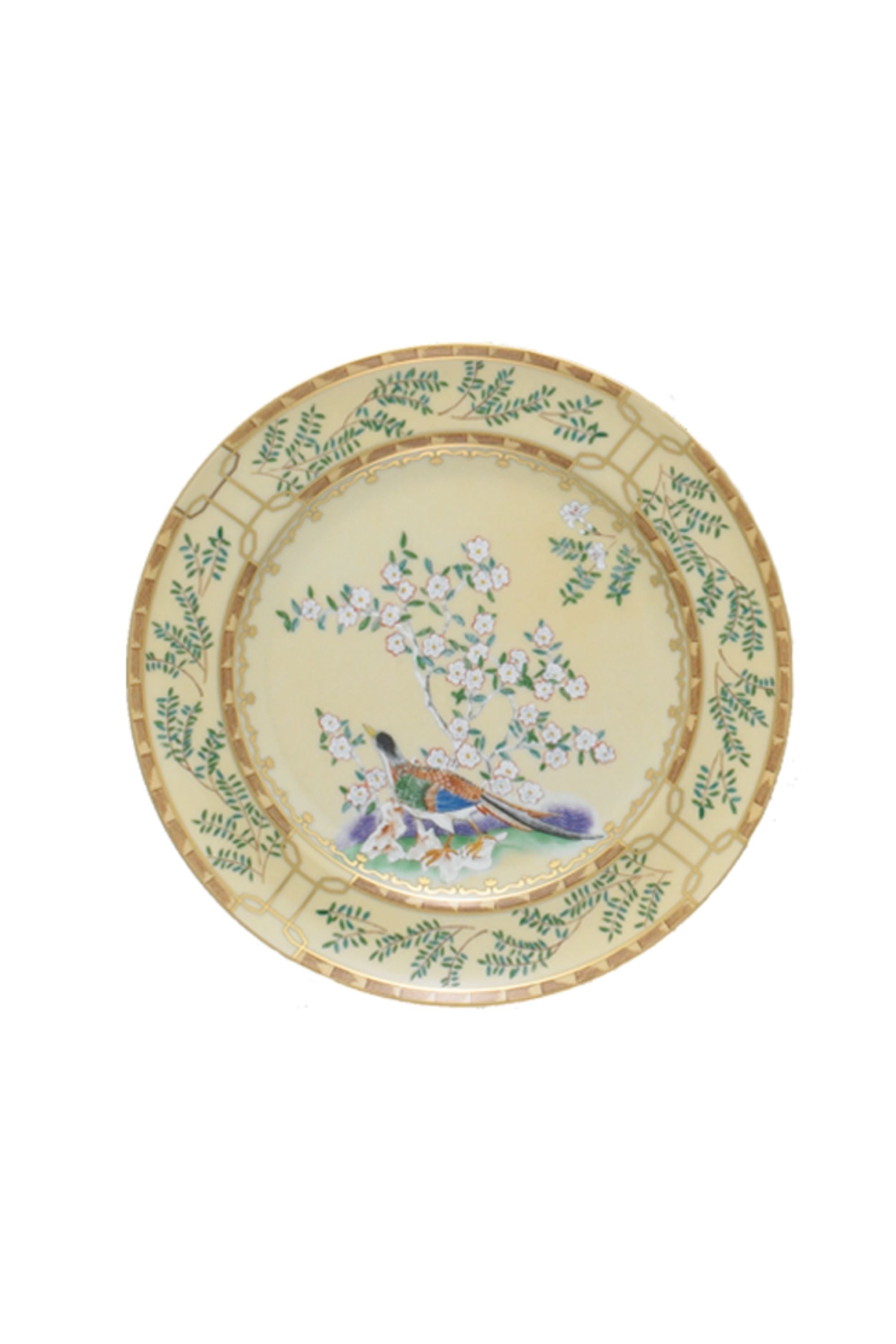Chinese dinnerware. The decoration incorporates blossoming trees, hanging baskets of flowers, and exotic birds.