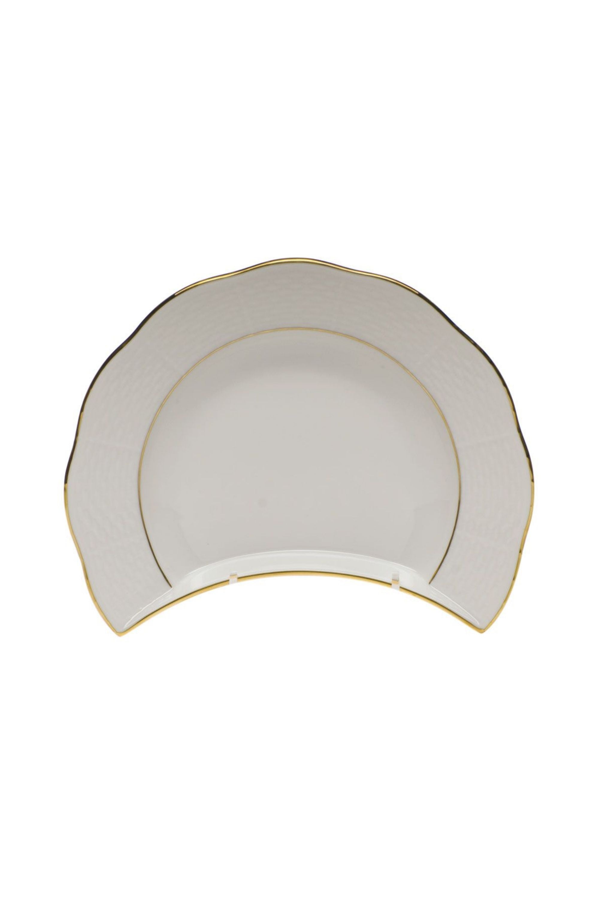 Dinnerware that is white with gold edge.