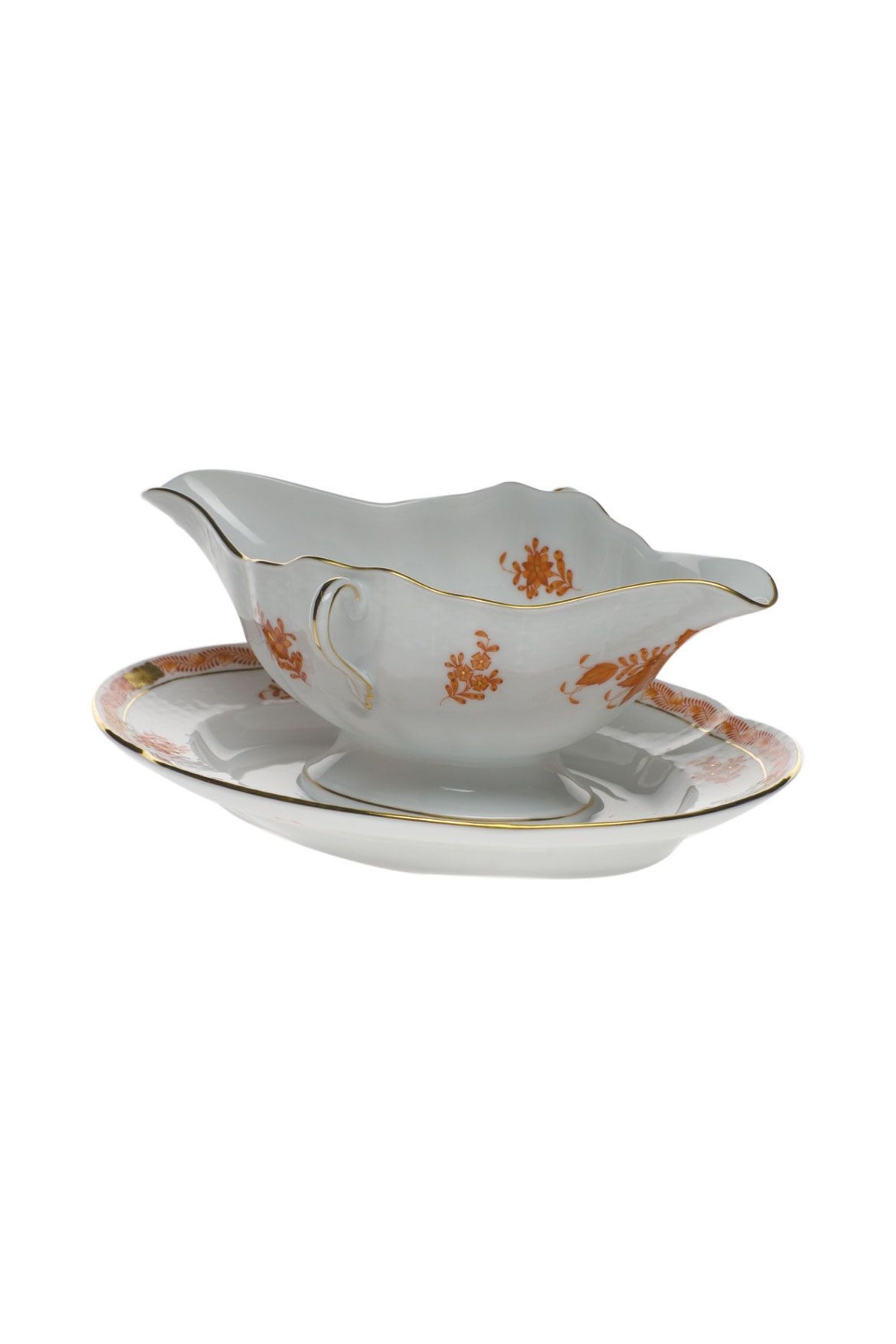 Chinese Bouquet is one of Herend’s most popular Oriental designs from the 1930s. Each piece is hand painted on white porcelain including 24k accents in rust.