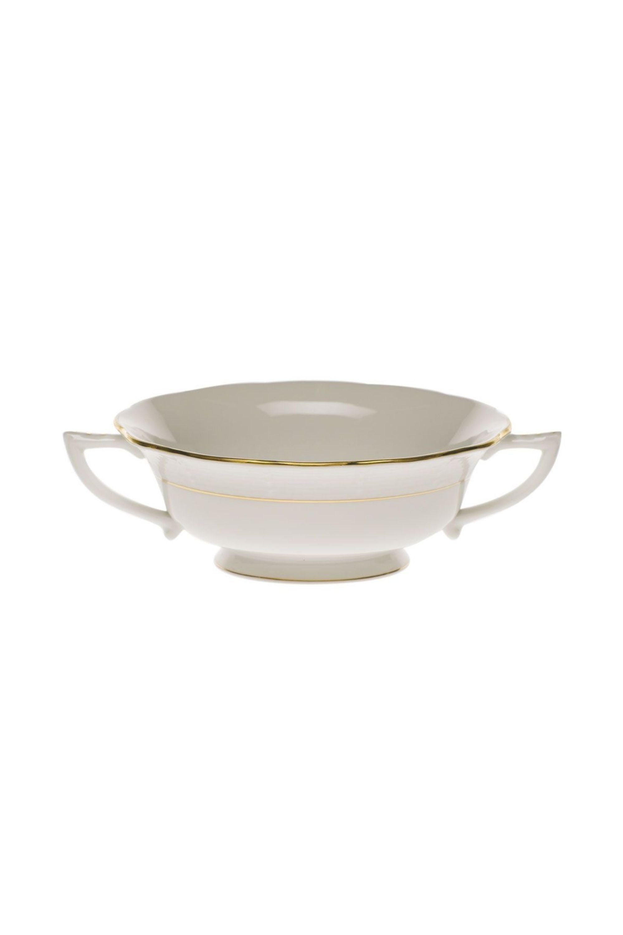 Dinnerware that is white with gold edge.