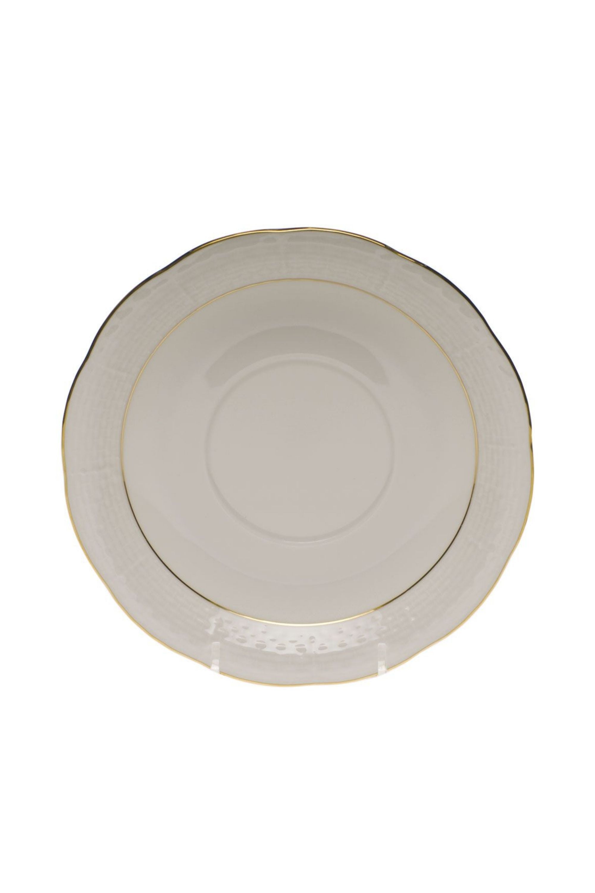 Dinnerware that is white with gold edge.