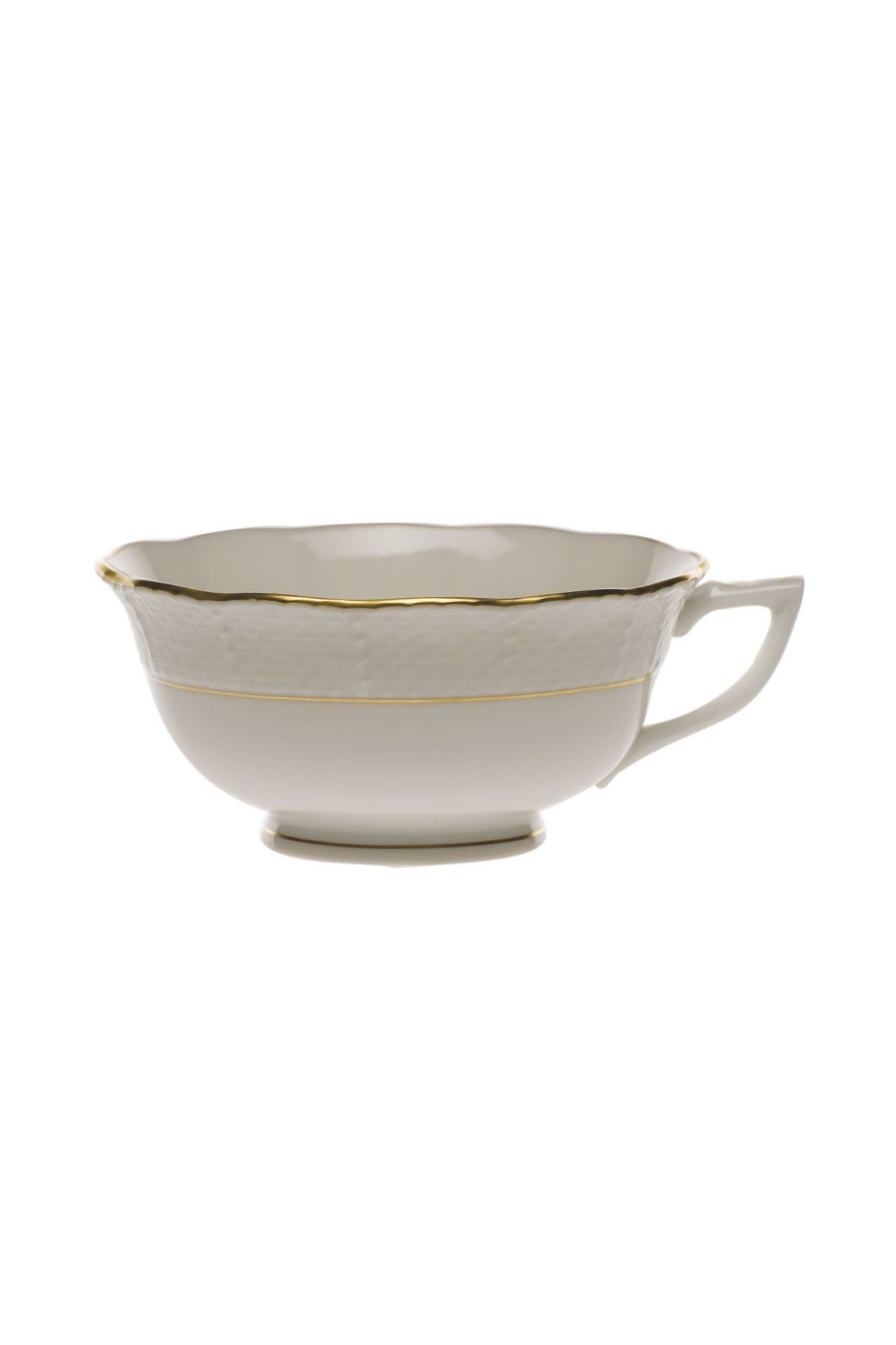 Tea service that is white with gold edge.