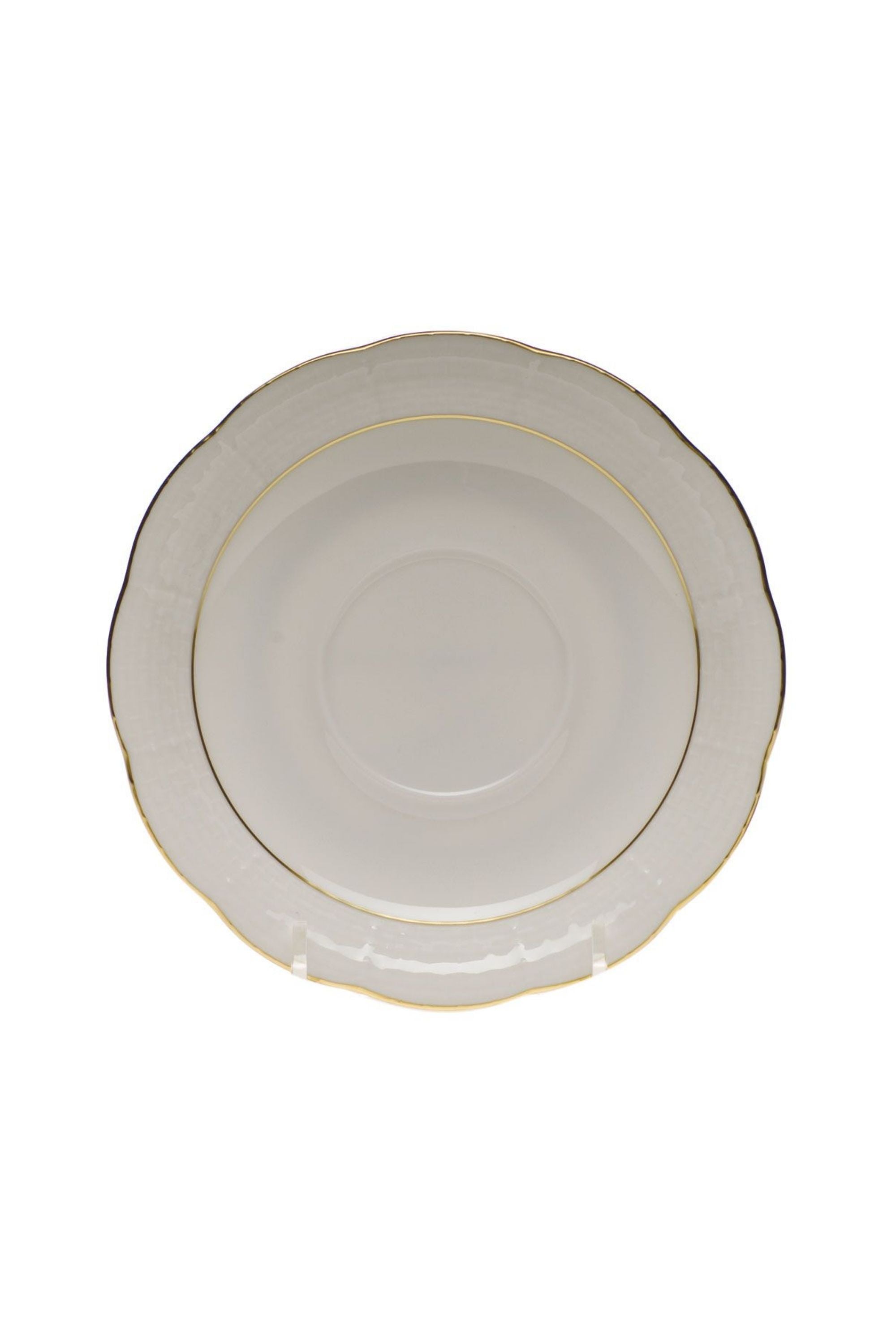 Tea service that is white with gold edge.