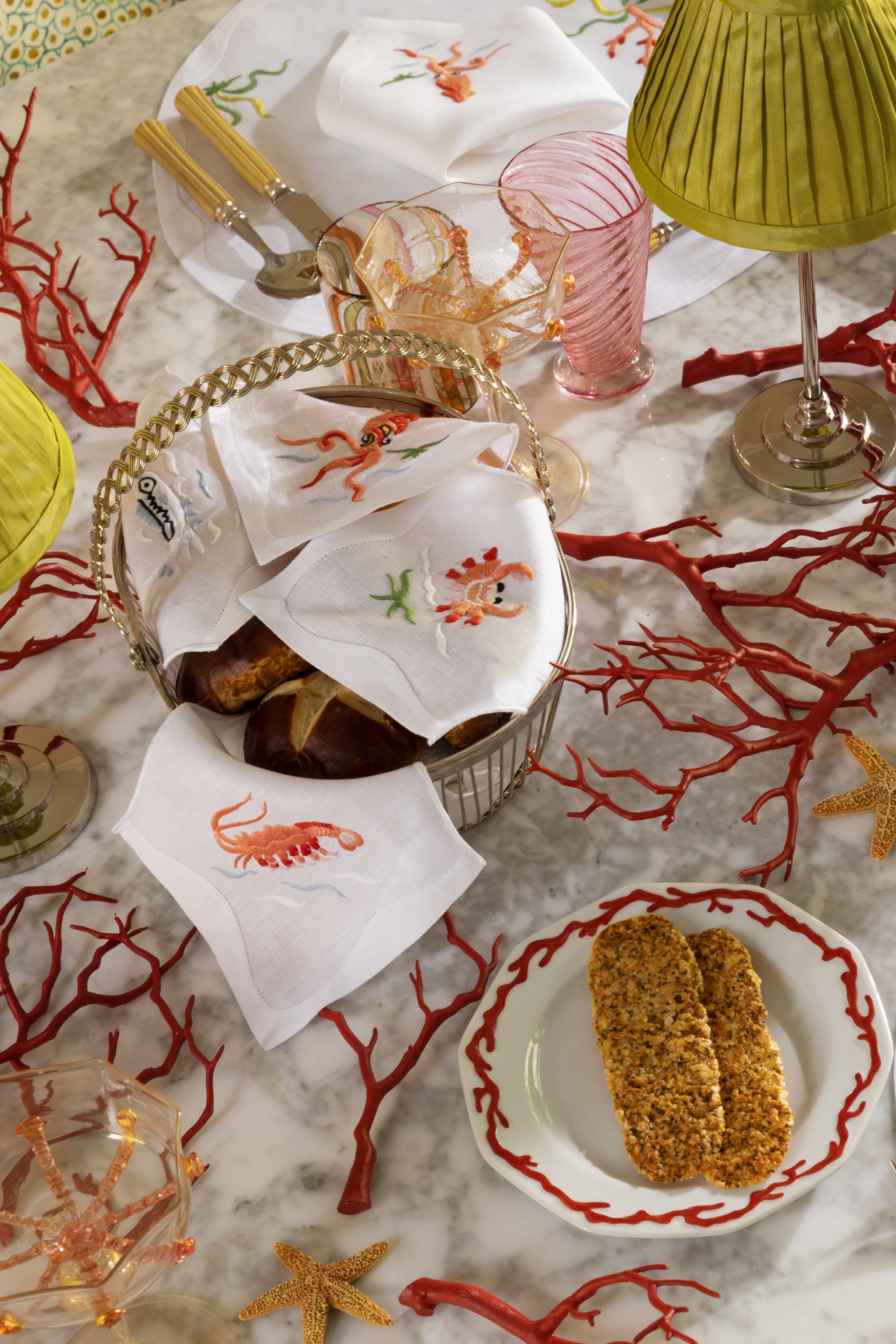 Uniquely beautiful patterned plates with a necklace of raised hand-painted red coral on the shoulder.
