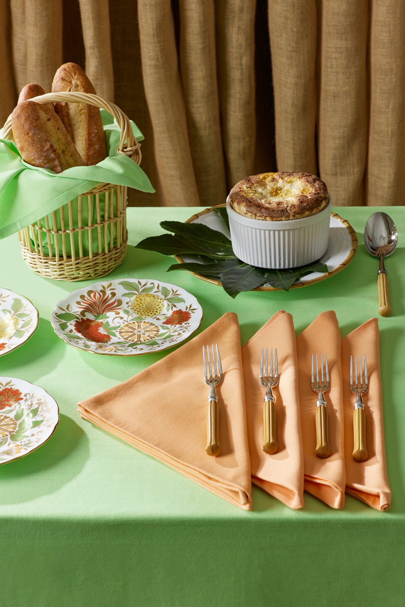 Stainless steel with silver plate and boxwood handles, dishwasher safe, made in France.