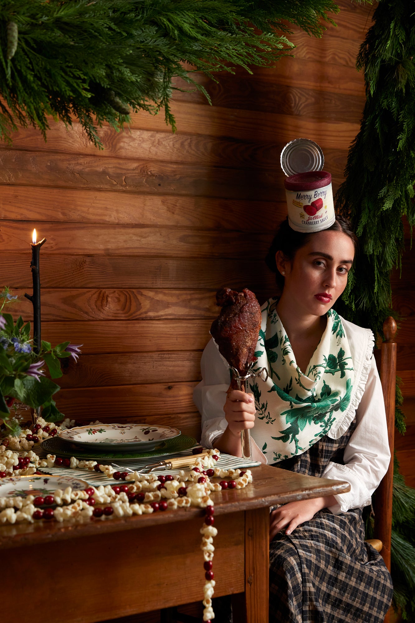 Girl wearing a cranberry can headband.