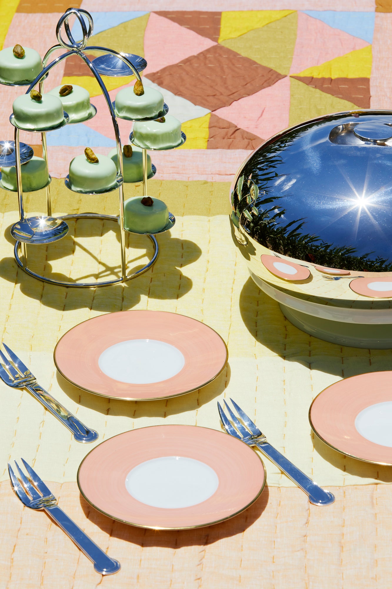 This silver-plated display tower with 12 plates makes friandise, sushi, and canapes look covetable.