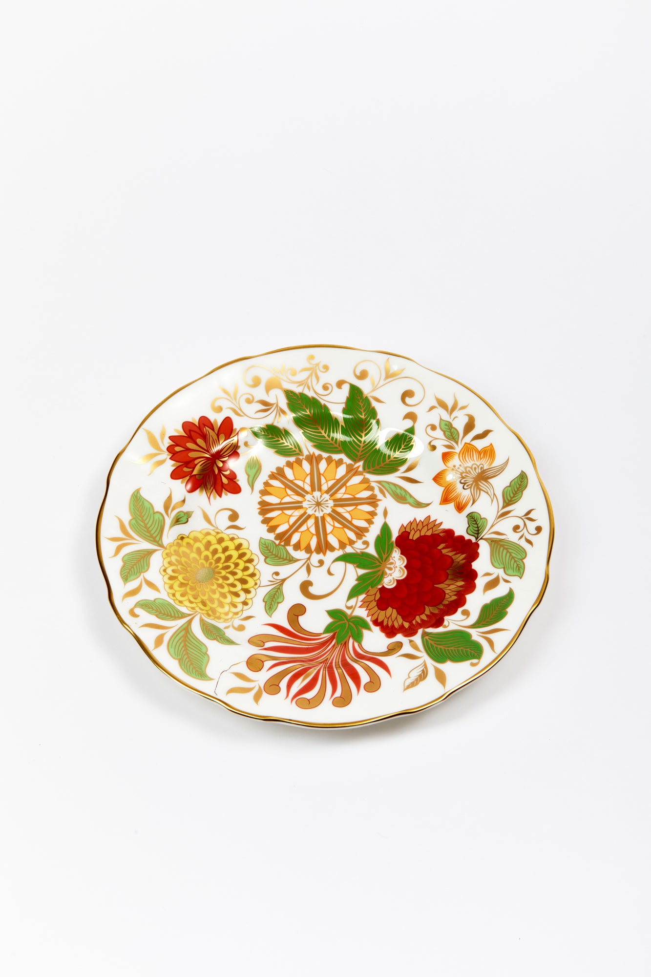 Handmade and decorated plates in England by Royal Crown Derby.