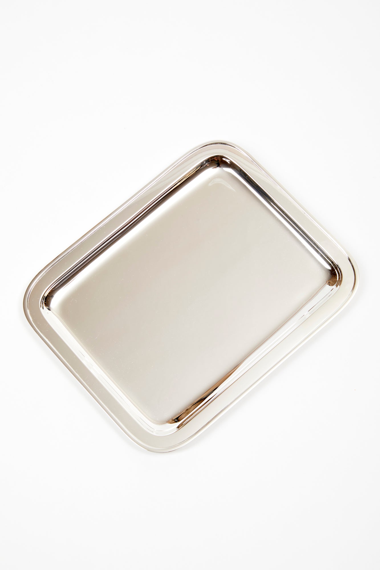 Silver-plated. 6.5"w x 8.25"l Silver Tray.