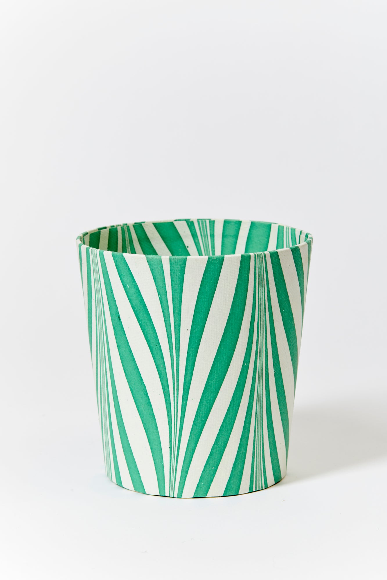 Artisan paper-covered cachepots with a plastic liner. Made to fit pots of standard seasonal bulbs or orchids.