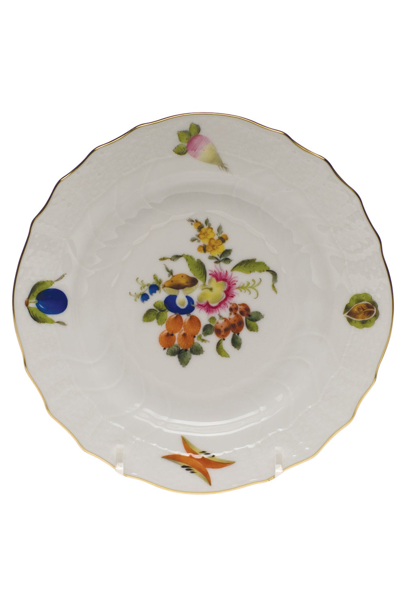 Porcelain dinnerware that has playful pattern surprises with tiny pink radishes, mushrooms and acorns.