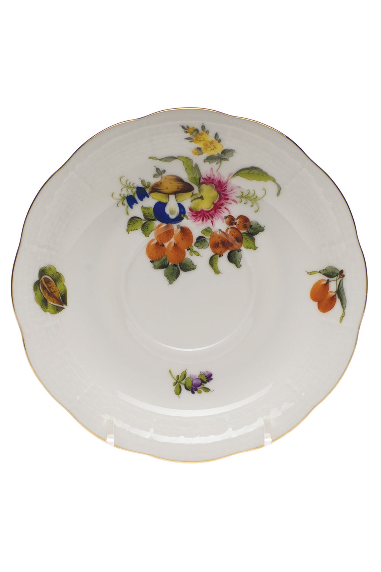 Porcelain dinnerware that has playful pattern surprises with tiny pink radishes, mushrooms and acorns.