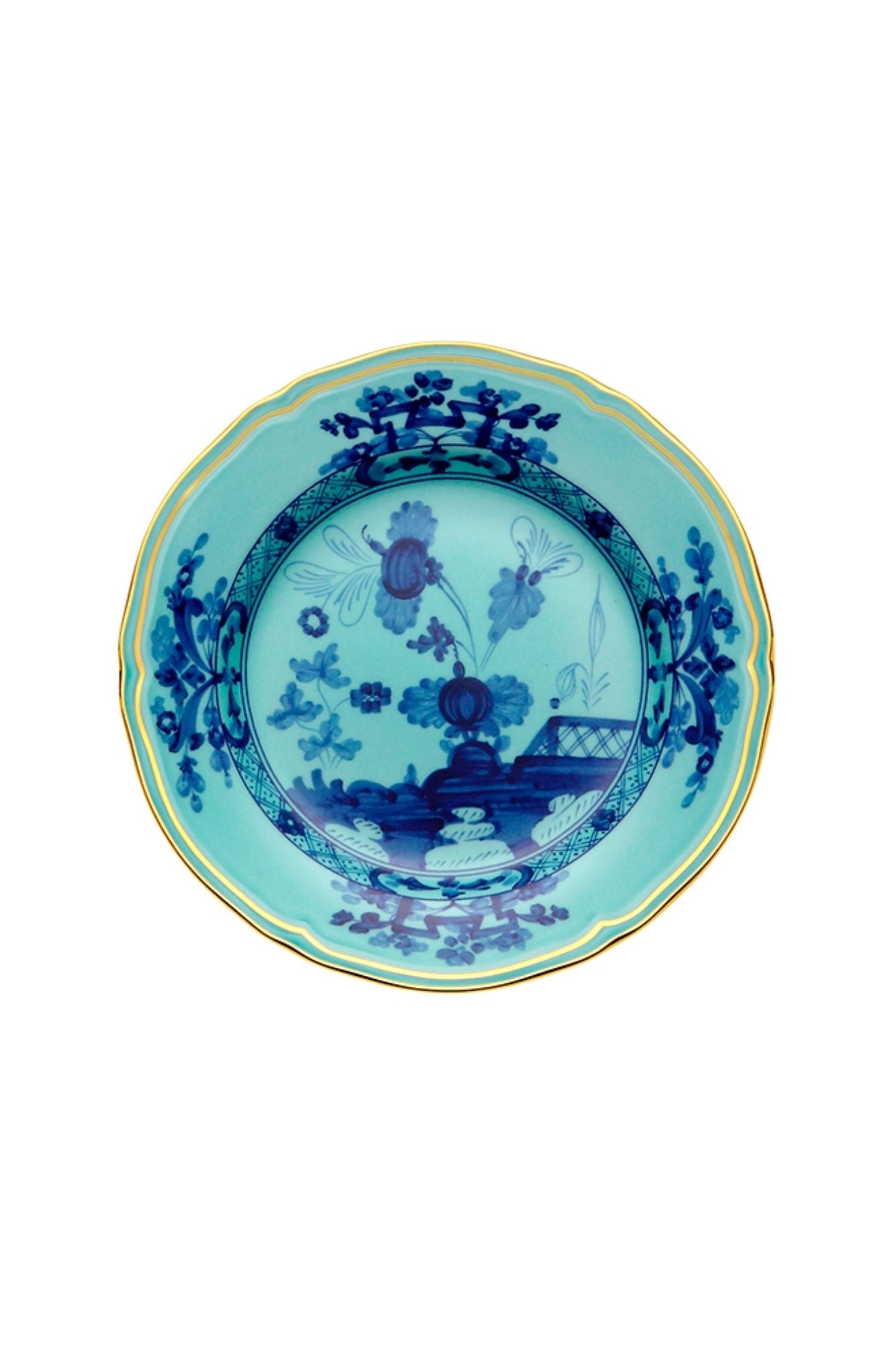 This turquoise and blue porcelain in Ginori’s traditional Antico Doccia shape is decorated with a stylized carnation reinterpreted by Gio Ponti in 1946. 24-karat yellow gold accents each piece.