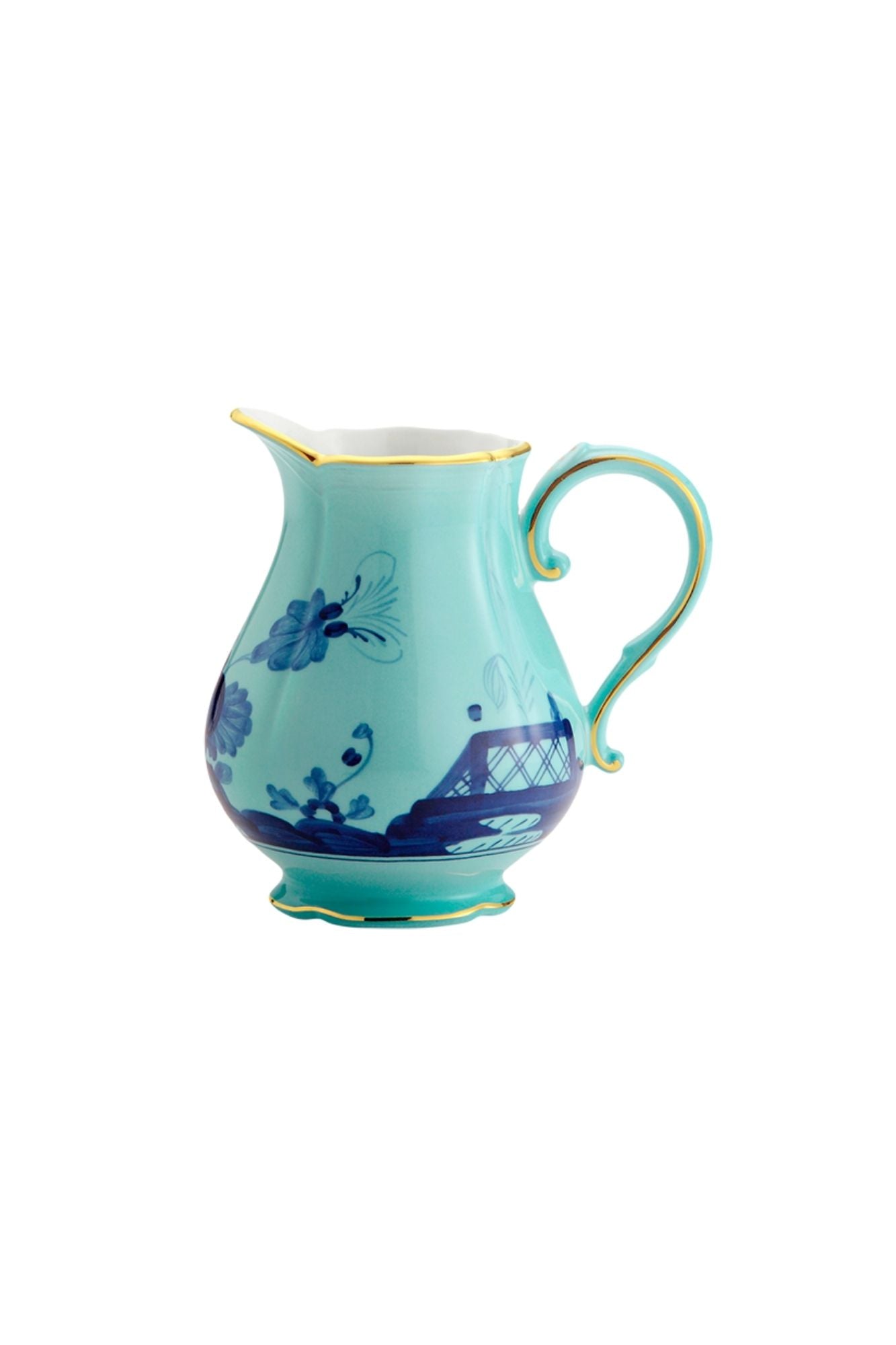 This turquoise and blue porcelain in Ginori’s traditional Antico Doccia shape is decorated with a stylized carnation reinterpreted by Gio Ponti in 1946. 24-karat yellow gold accents each piece.