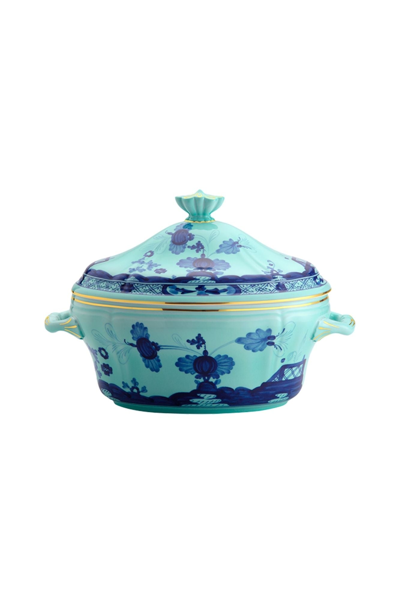 This turquoise and blue porcelain in Ginori’s traditional Antico Doccia shape is decorated with a stylized carnation reinterpreted by Gio Ponti in 1946. 24-karat yellow gold accents each piece.