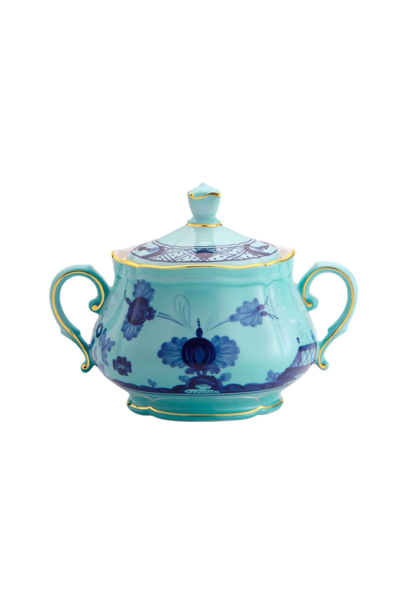 This turquoise and blue porcelain in Ginori’s traditional Antico Doccia shape is decorated with a stylized carnation reinterpreted by Gio Ponti in 1946. 24-karat yellow gold accents each piece.