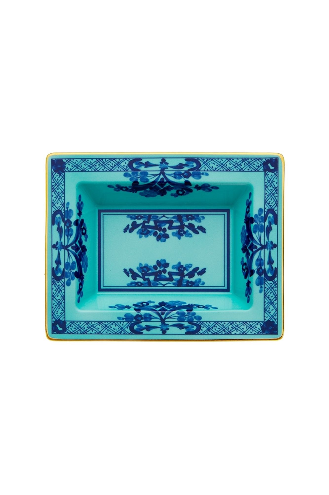 This turquoise and blue porcelain in Ginori’s traditional Antico Doccia shape is decorated with a stylized carnation reinterpreted by Gio Ponti in 1946. 24-karat yellow gold accents each piece.