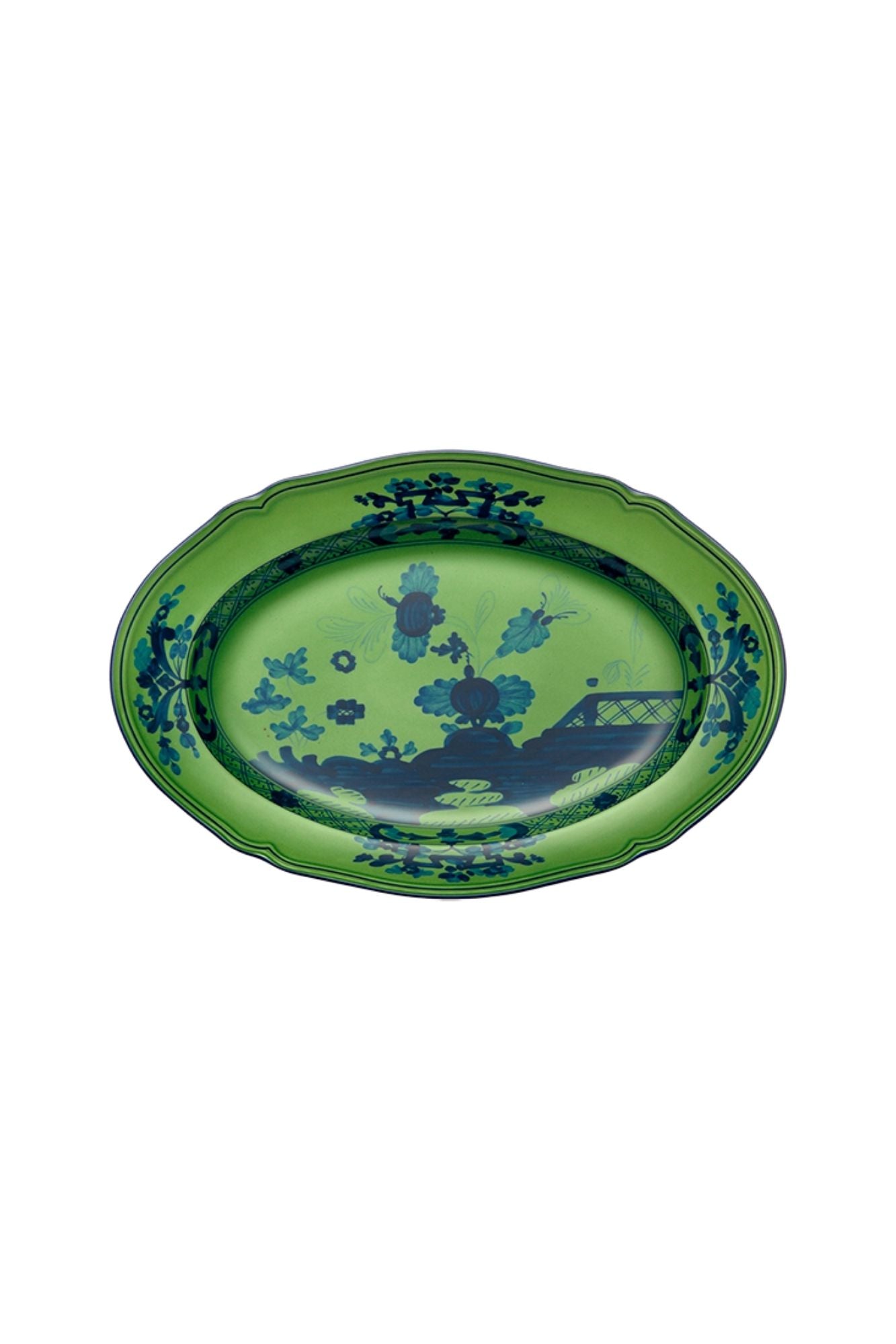 This green and blue porcelain dinnerware is in Ginori’s traditional Antico Doccia shape is decorated with a stylized carnation reinterpreted by Gio Ponti in 1946. Handmade and decorated in Italy.
