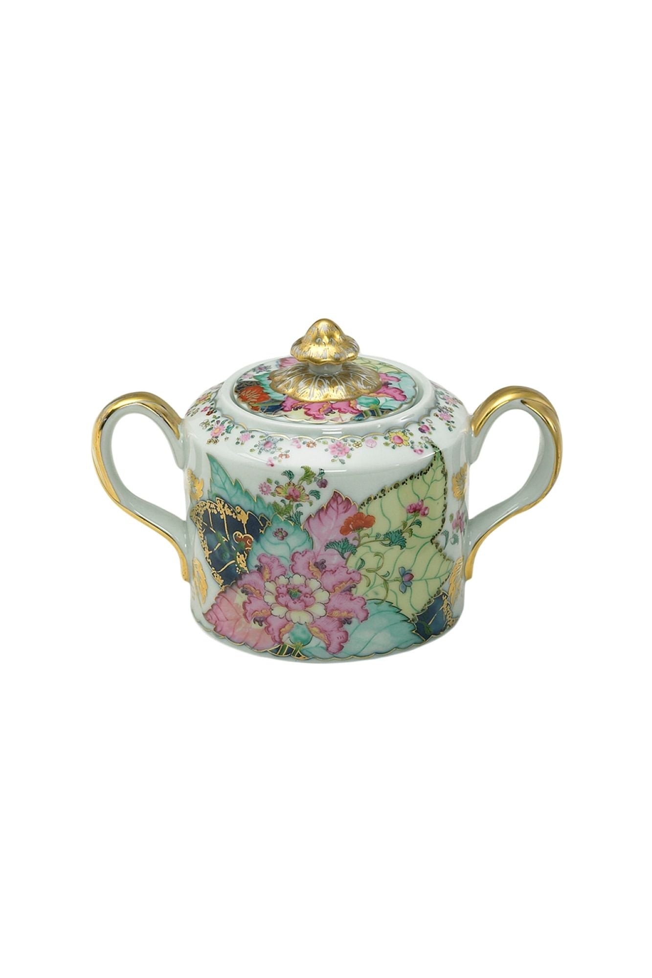 Dinnerware with a small phoenix bird perches on the leaves of the flowering Nicotiana (Tobacco) plant. Twenty-seven colors and 22k gold make up this pattern based on an original in the Metropolitan Museum of Art.
