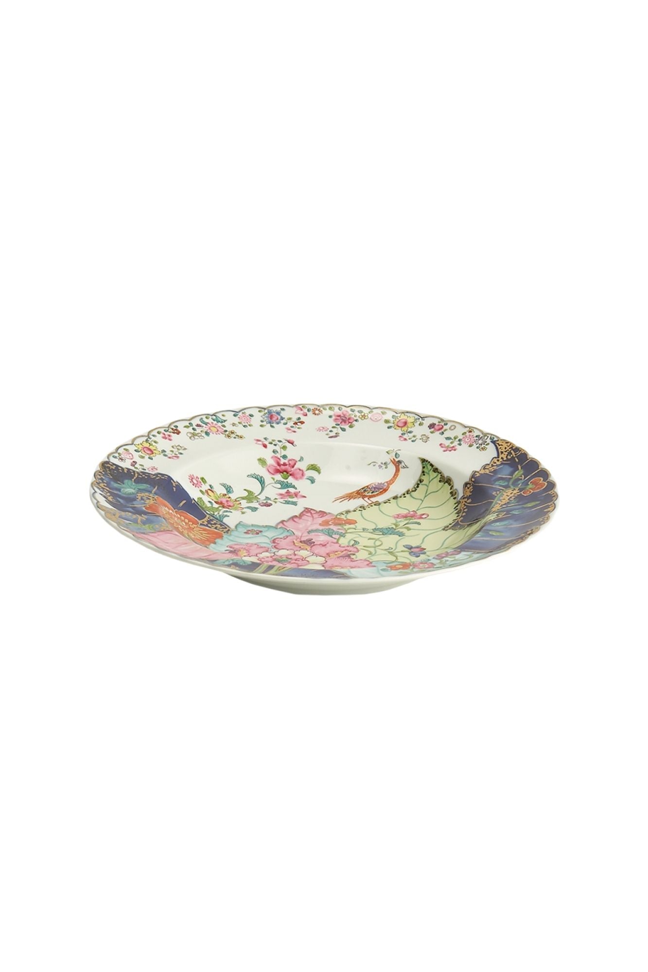 Dinnerware with a small phoenix bird perches on the leaves of the flowering Nicotiana (Tobacco) plant. Twenty-seven colors and 22k gold make up this pattern based on an original in the Metropolitan Museum of Art.