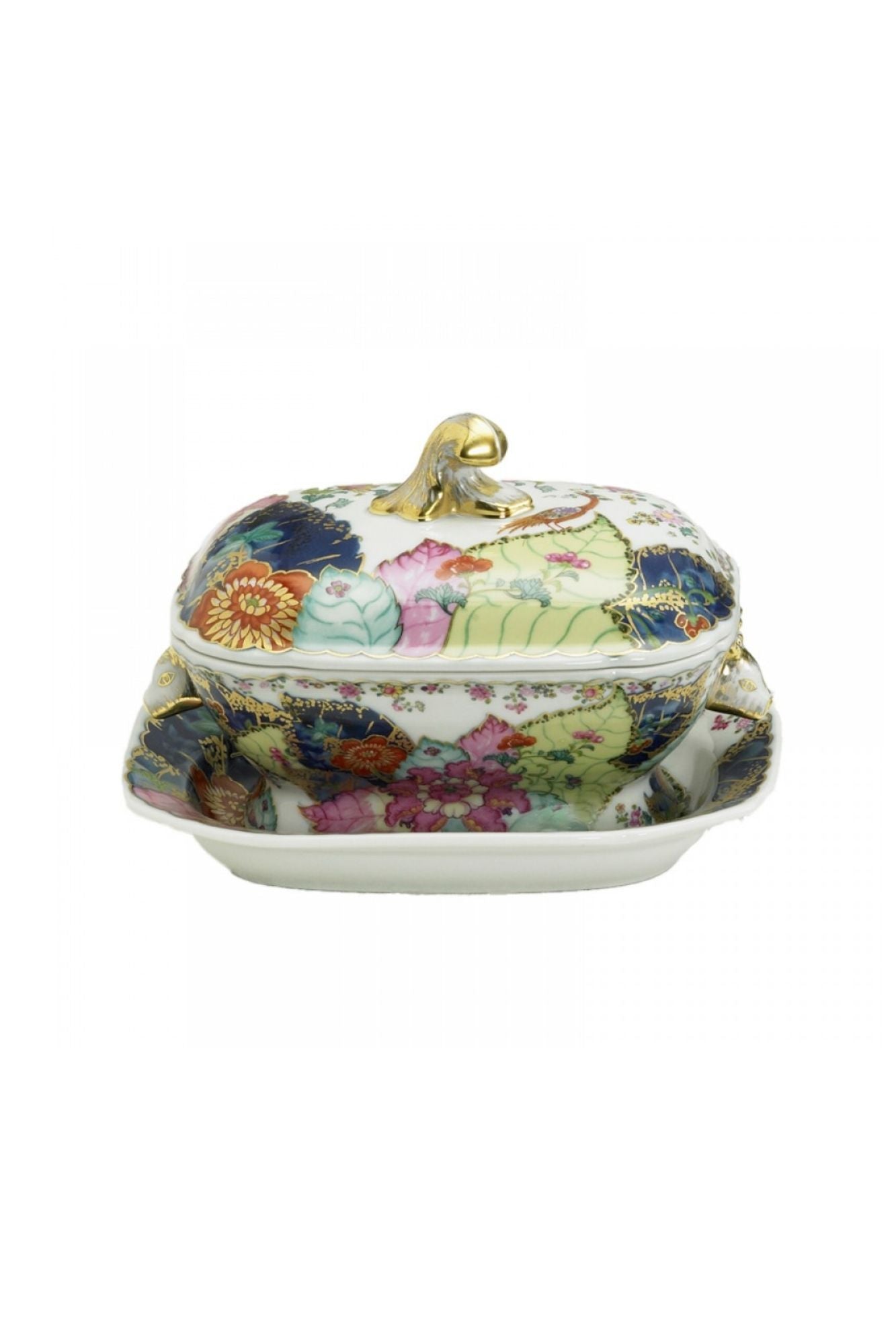 Dinnerware with a small phoenix bird perches on the leaves of the flowering Nicotiana (Tobacco) plant. Twenty-seven colors and 22k gold make up this pattern based on an original in the Metropolitan Museum of Art.