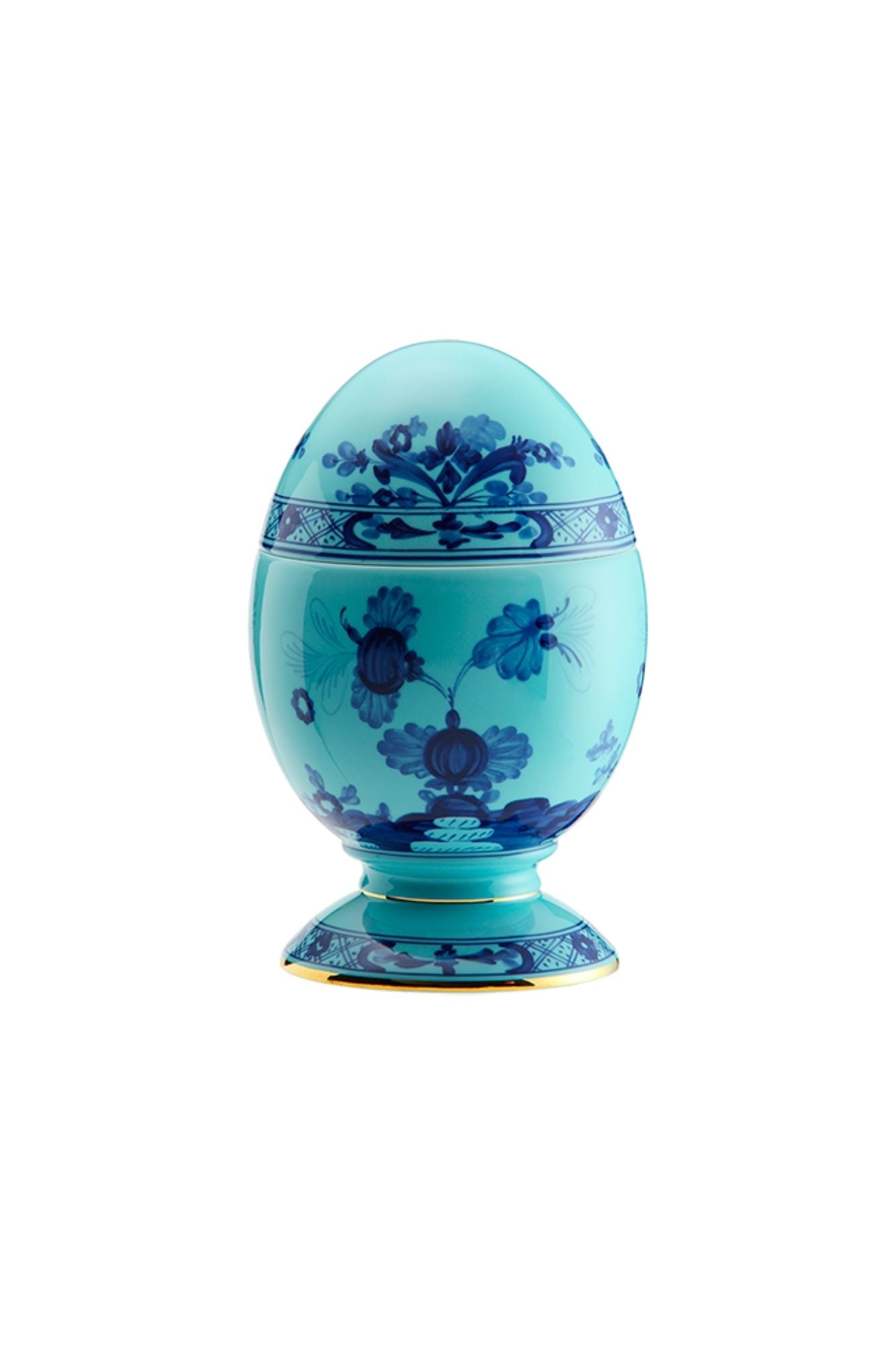 This turquoise and blue porcelain in Ginori’s traditional Antico Doccia shape is decorated with a stylized carnation reinterpreted by Gio Ponti in 1946. 24-karat yellow gold accents each piece.