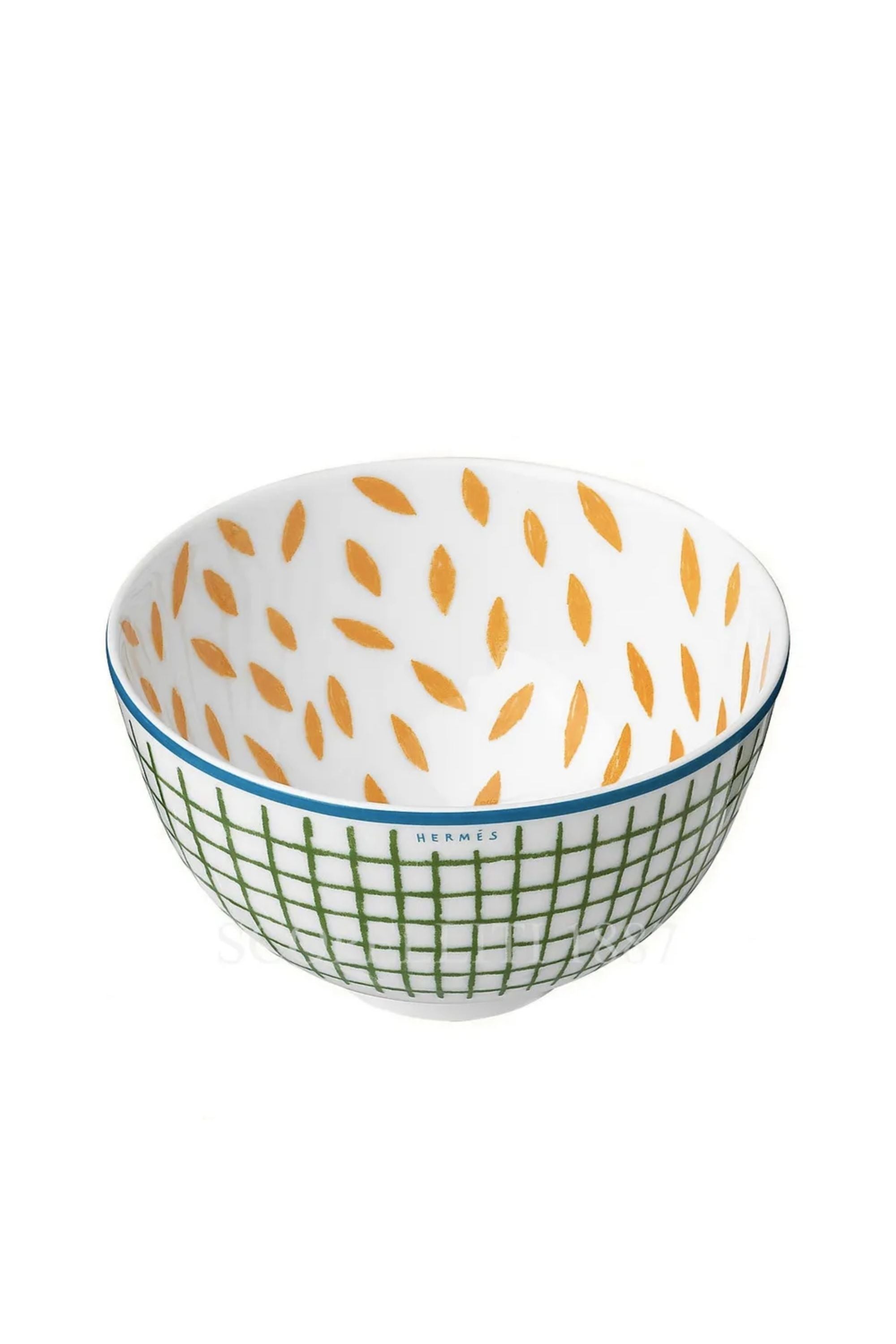 Dinnerware designed by Irish illustrator Nigel Peake, Hermes' "A Walk in the Garden" takes us on a picturesque path through an English garden.