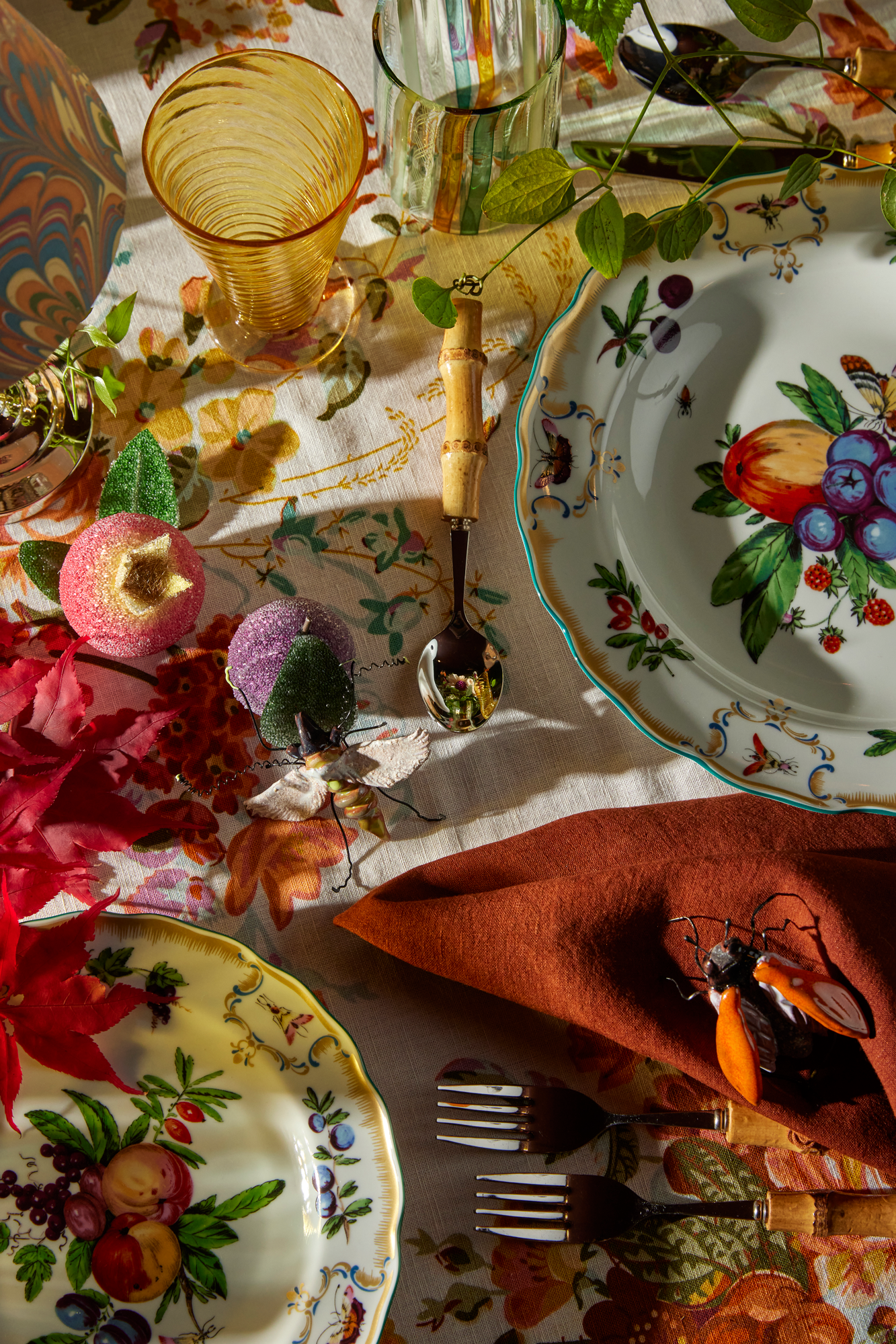 Handmade ceramic insects in various shapes, glazes, and guises.