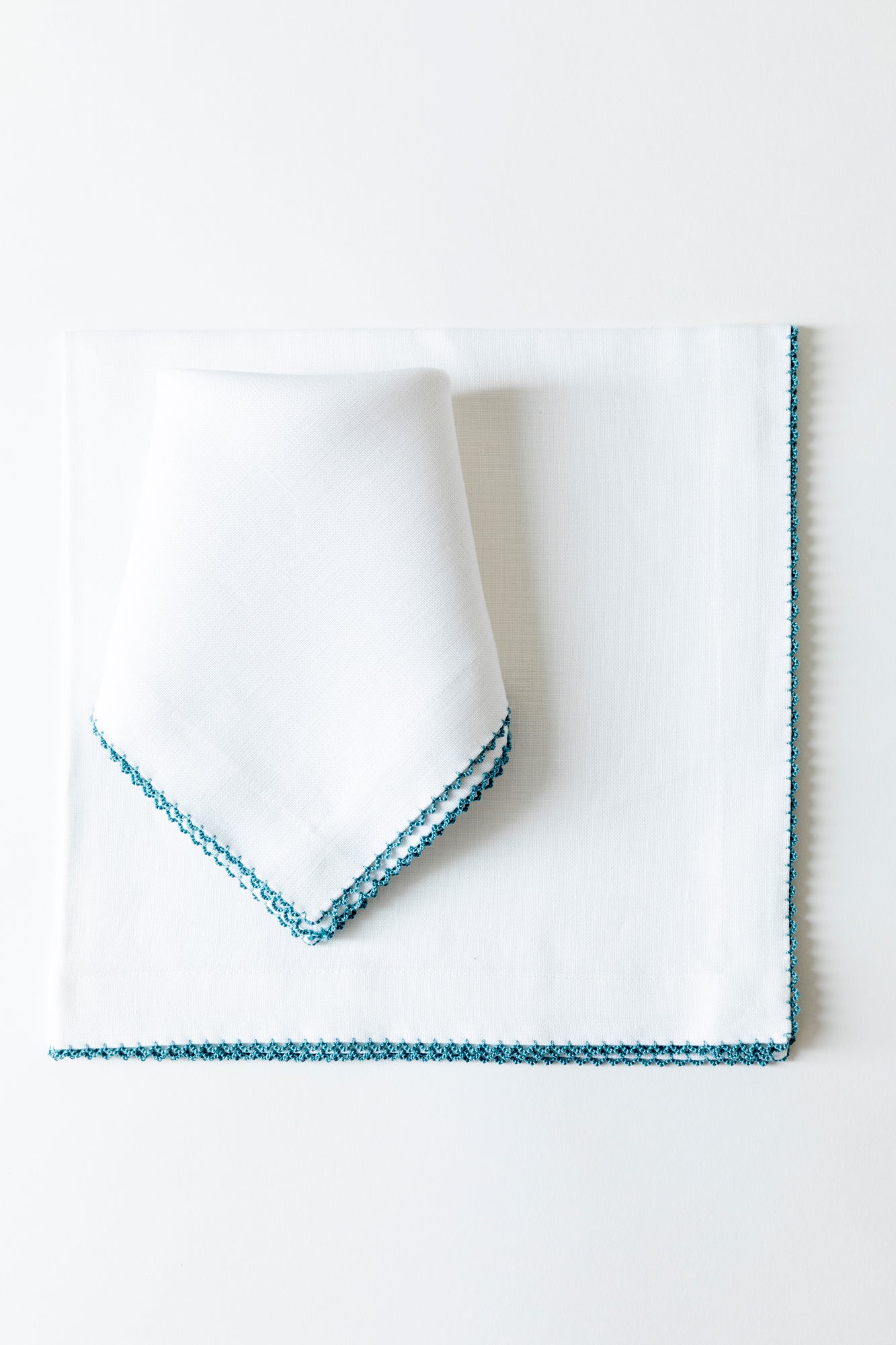 Linen dinner napkin with hand stitched Picot edge.